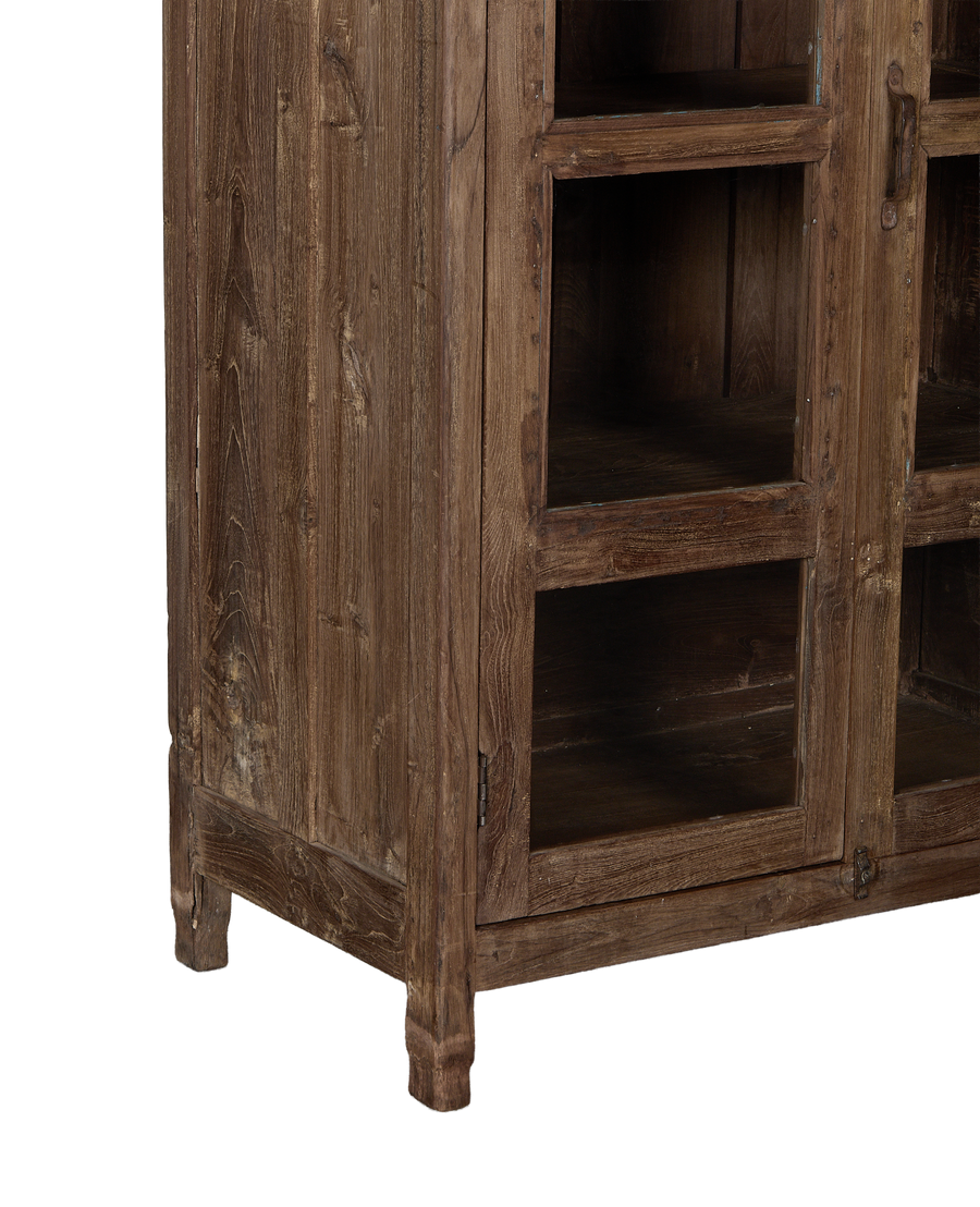 Close-up of vintage Indian oak wood cabinet's natural grain and distressed finish.