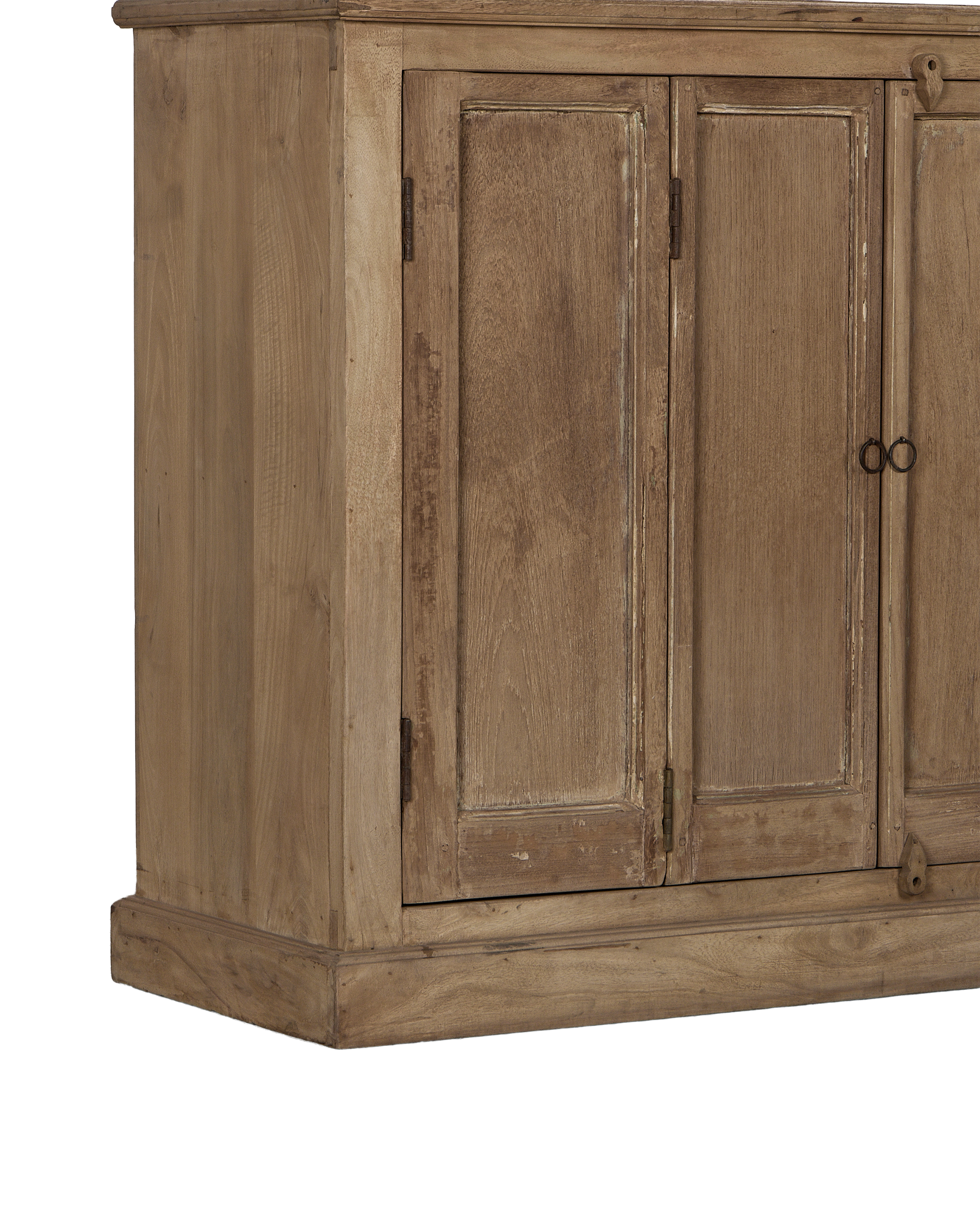 Side view of vintage bleached oak cabinet from India, showing rustic doors and base.