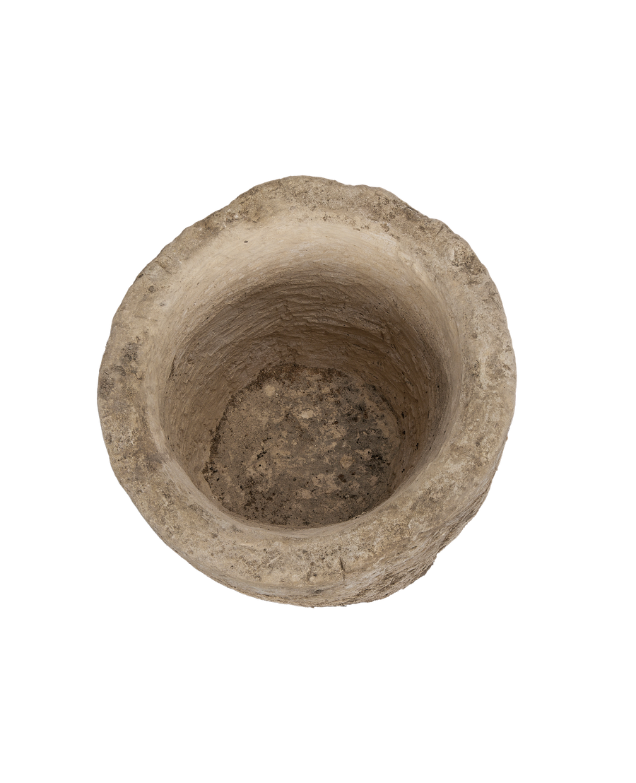 Vintage Indonesian limestone round trough from above, showing rugged interior texture and aged condition.