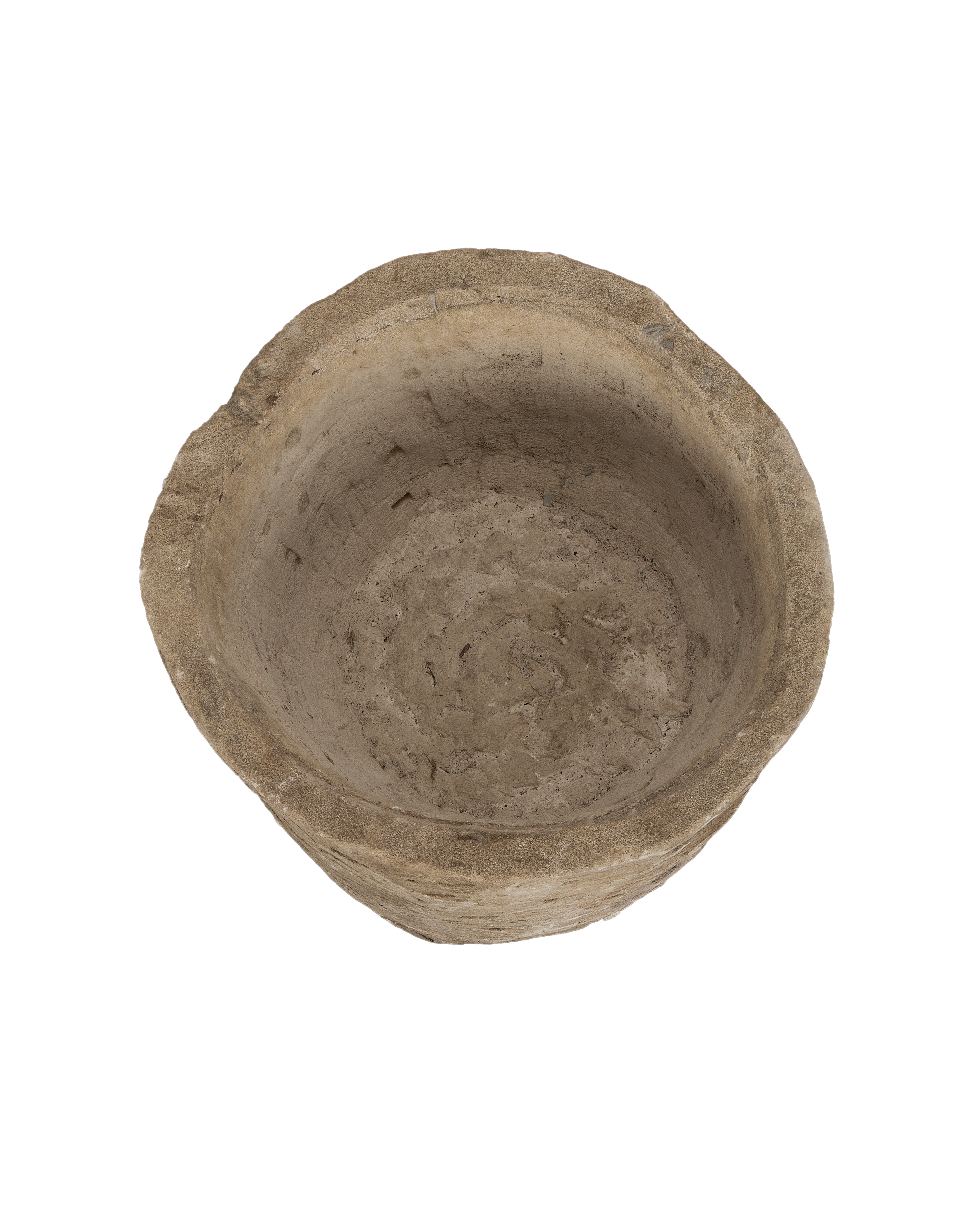 Vintage round Indonesian limestone trough, top-down view showing interior texture.