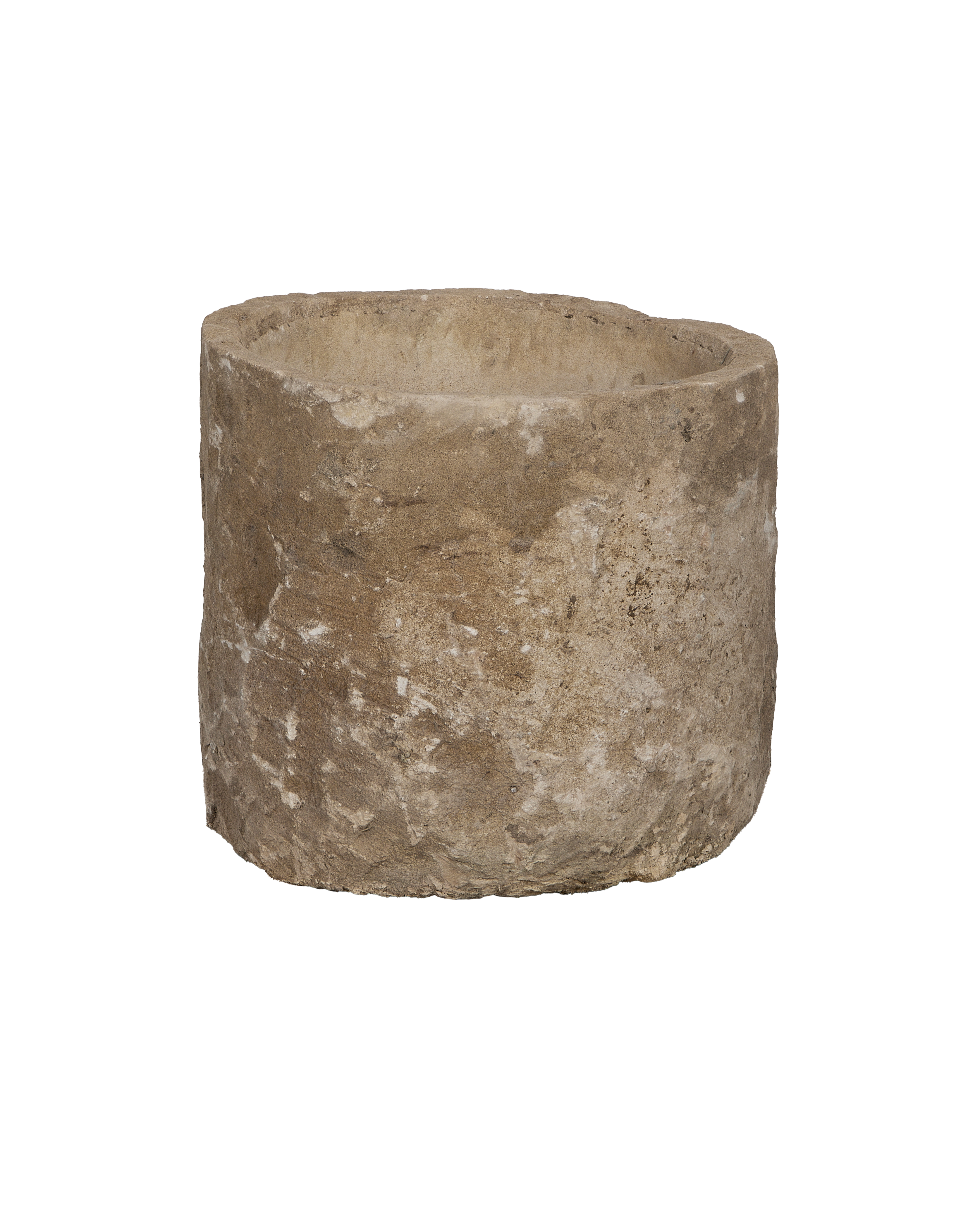 Round vintage Indonesian limestone trough, showing a rugged exterior texture and weathered surface.