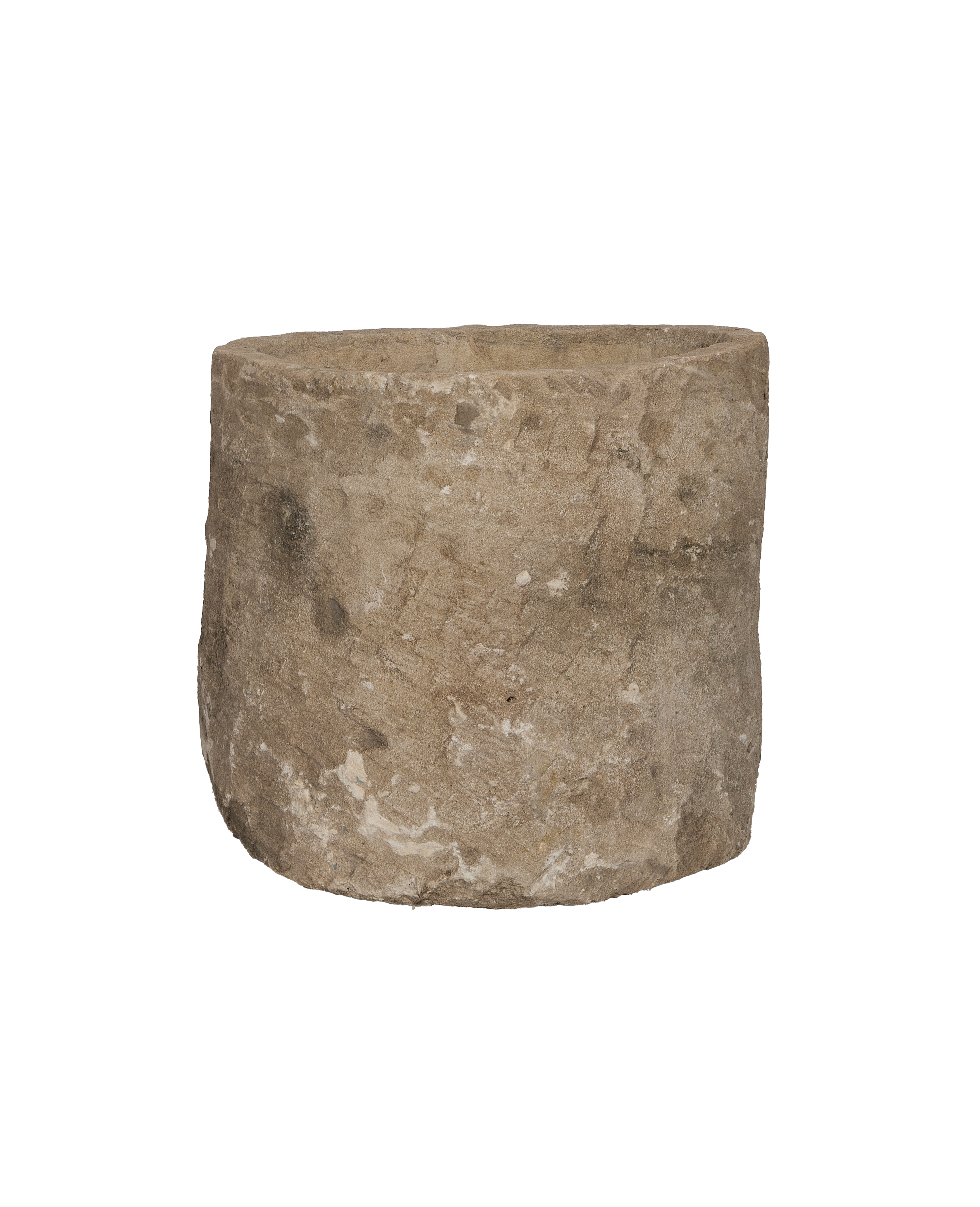 Vintage Indonesian round limestone trough, showing coarse textured surface detail.