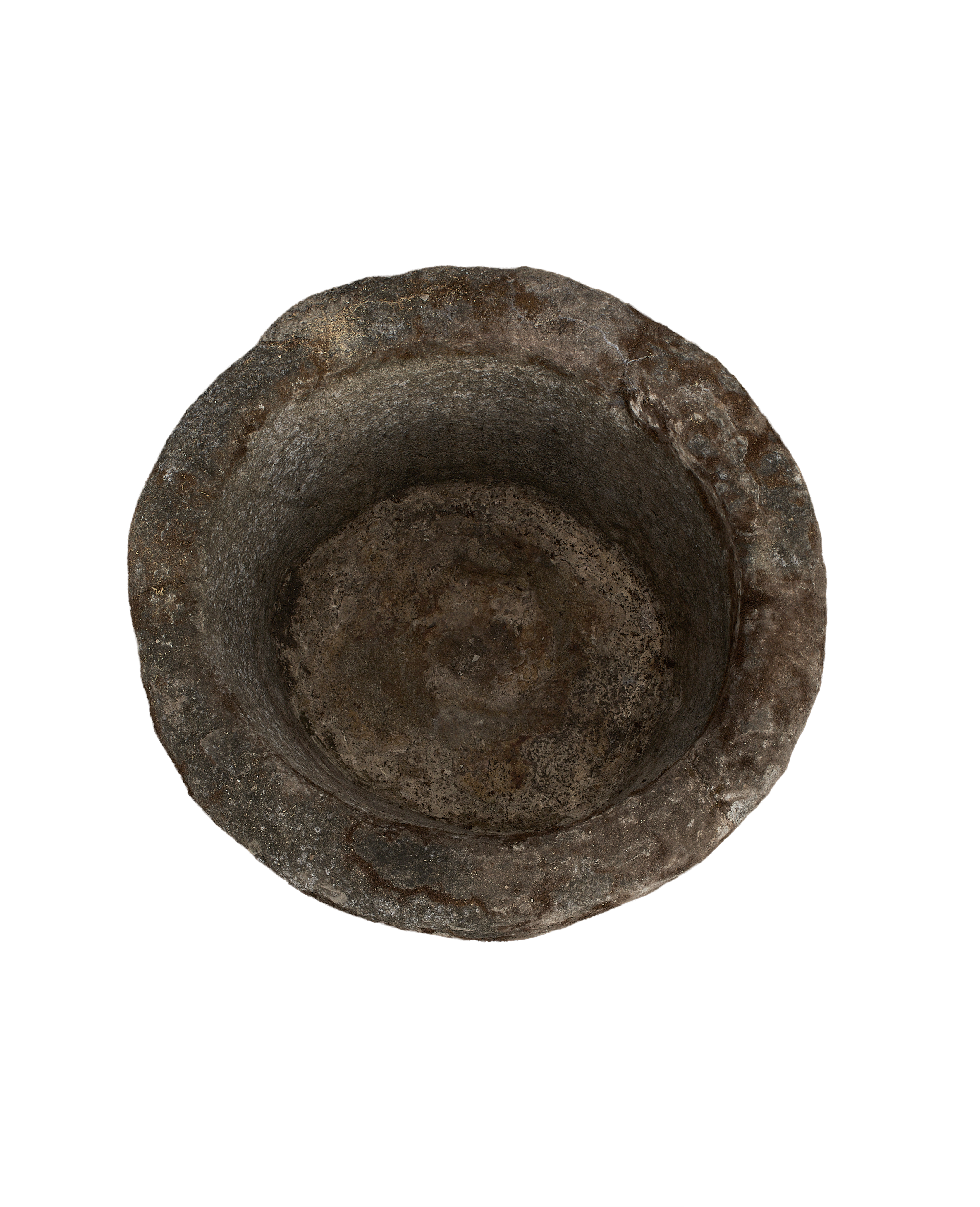 Vintage Indonesian limestone trough, top-down view showing deep round basin and weathered texture.