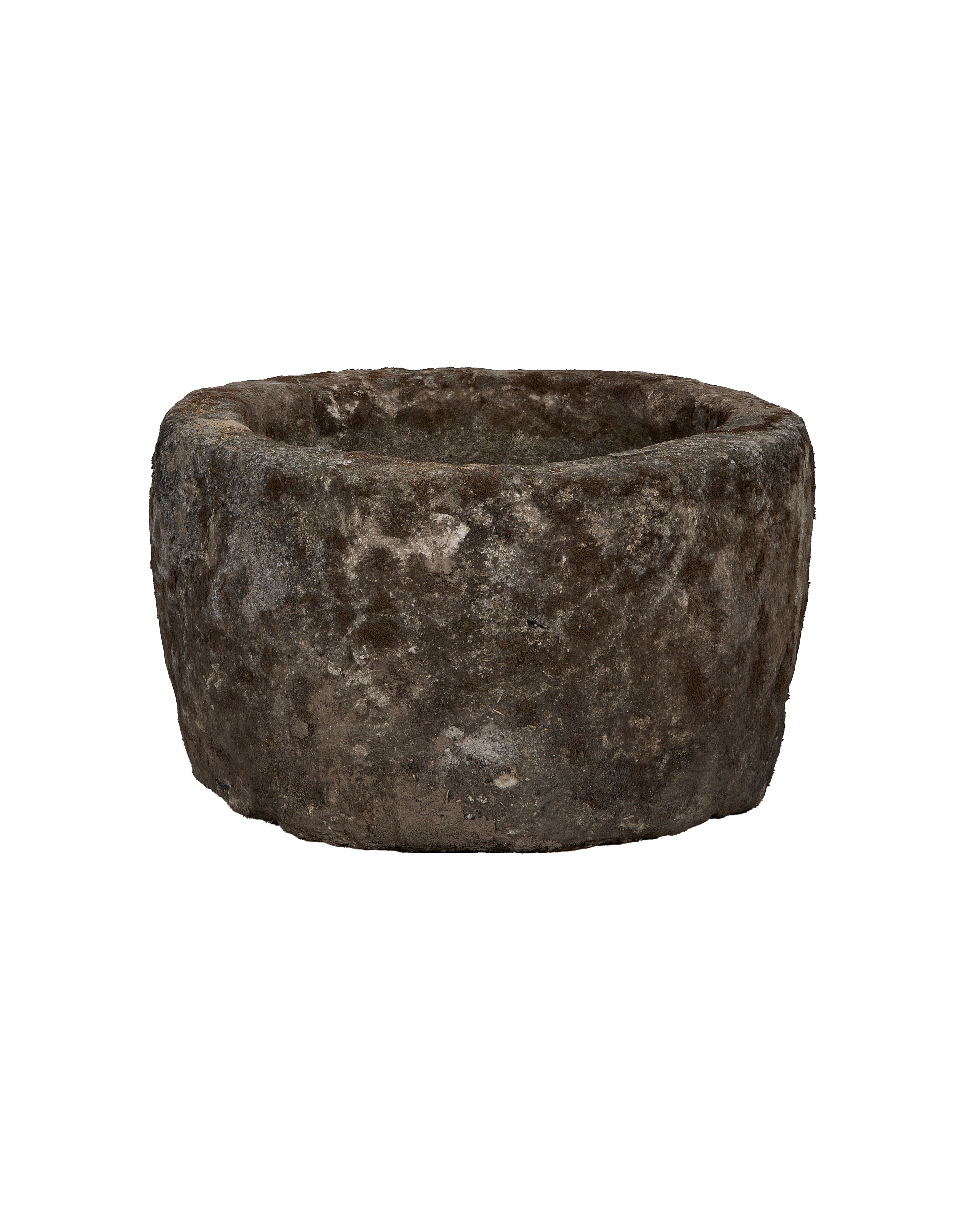 Vintage round limestone trough, rich textured surface showing wear, darker side view.