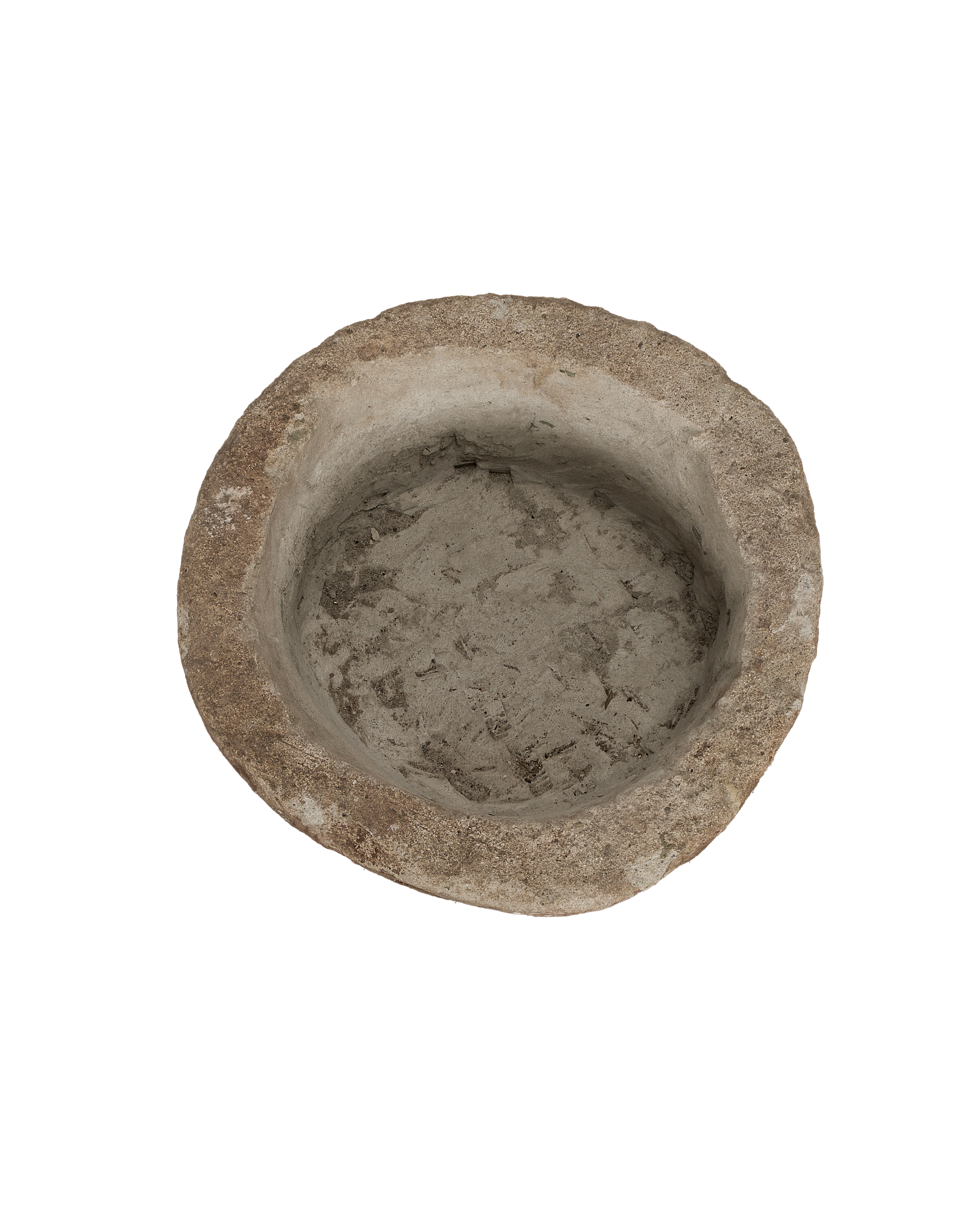 Vintage Indonesian limestone trough, top view reveals rustic, textured interior, round shape.