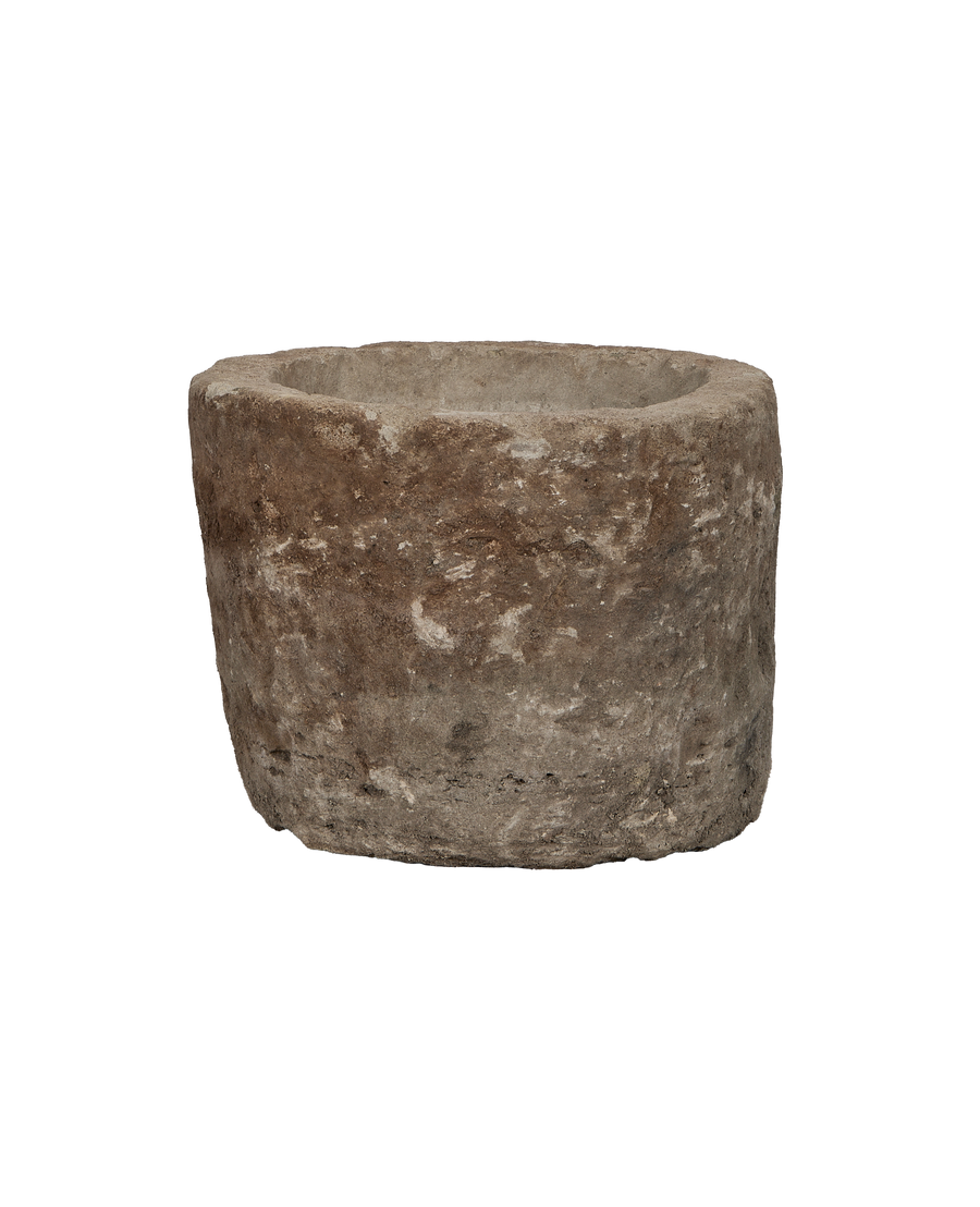 Vintage Indonesian round limestone trough, showcasing textured exterior and rustic, weathered condition.