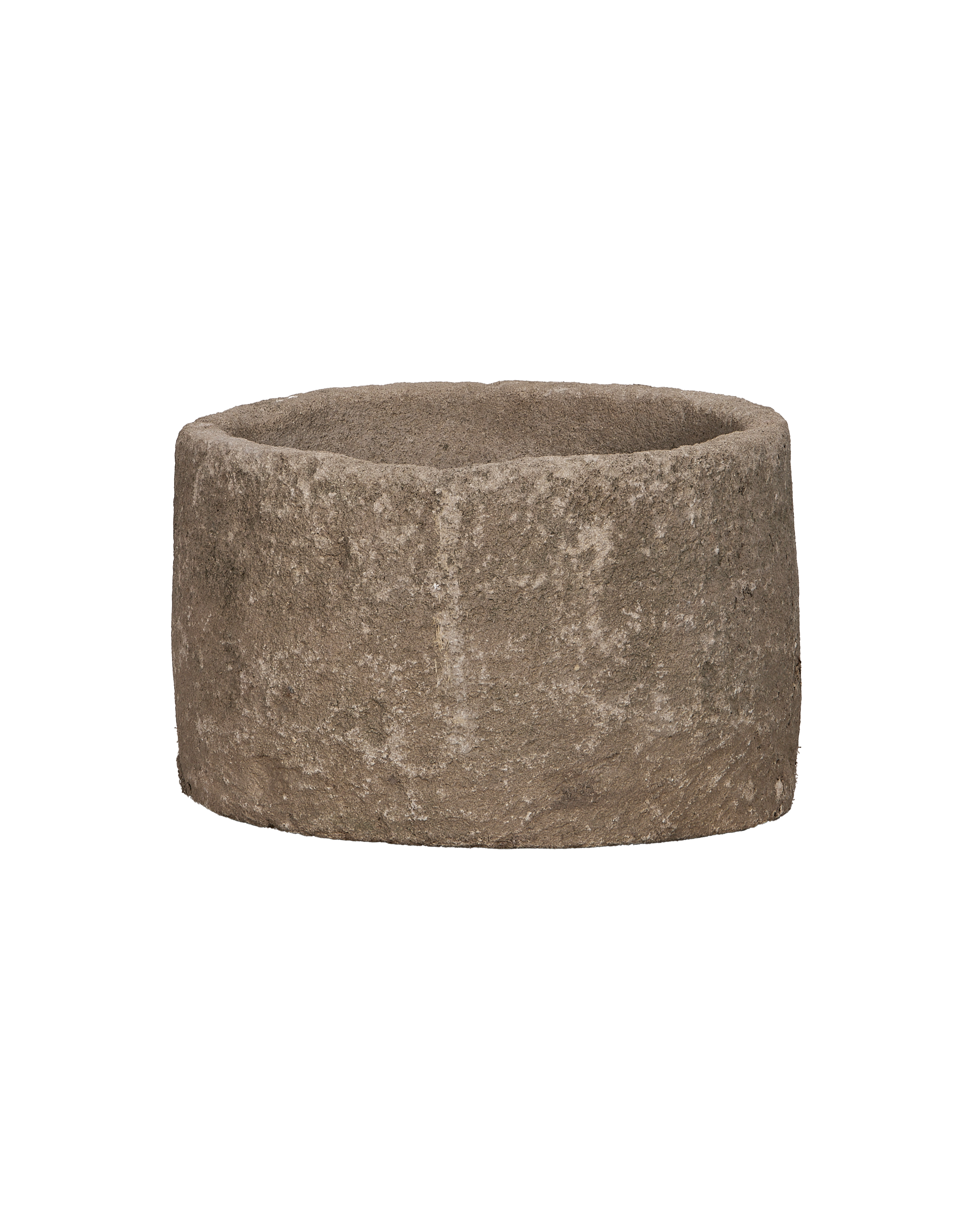 Vintage Indonesian round limestone trough, coarse texture, full front view.