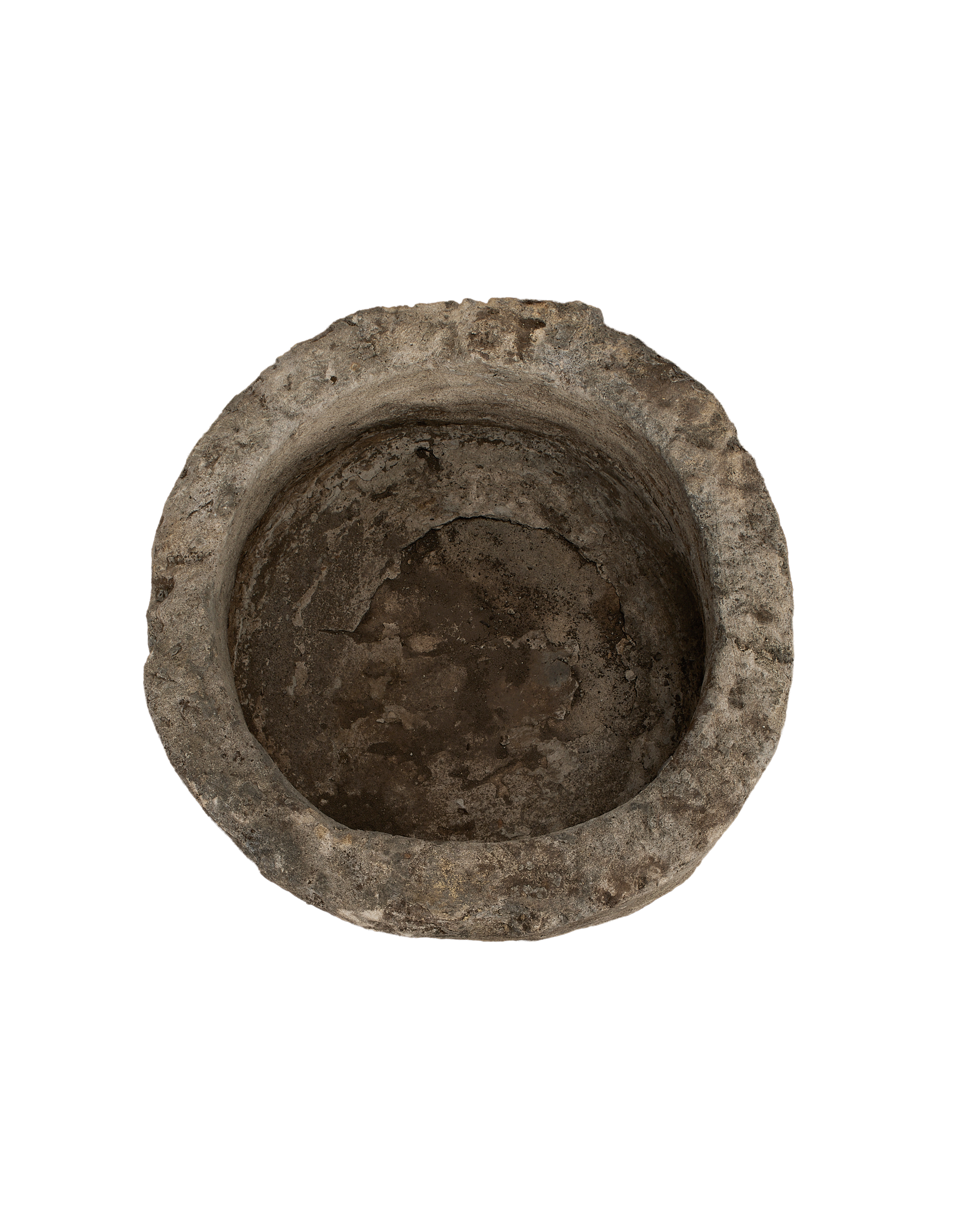 Vintage Indonesian round limestone trough, top-down view showing interior texture and aged patina.