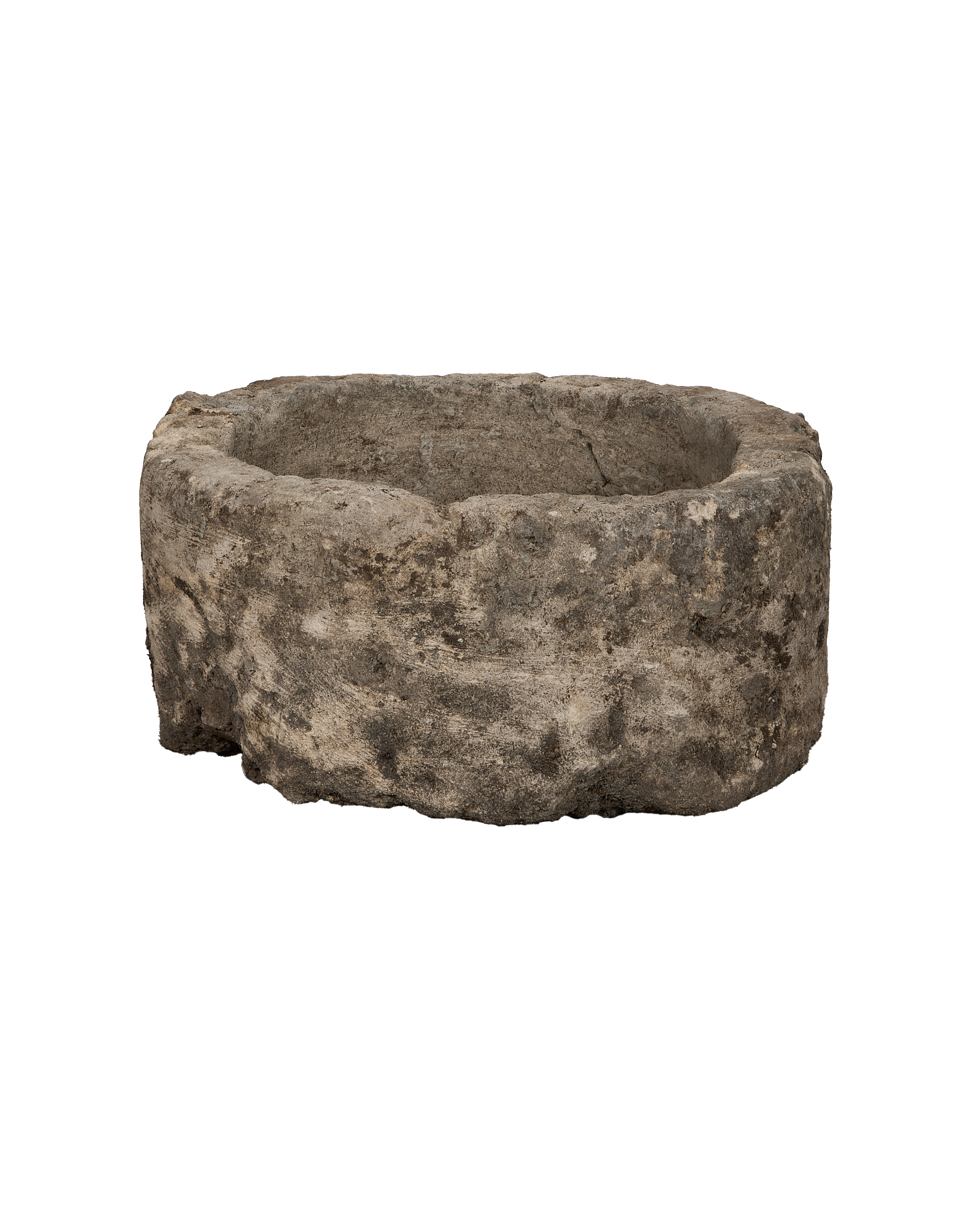 Vintage Indonesian OAK limestone trough with weathered exterior texture, close-up.