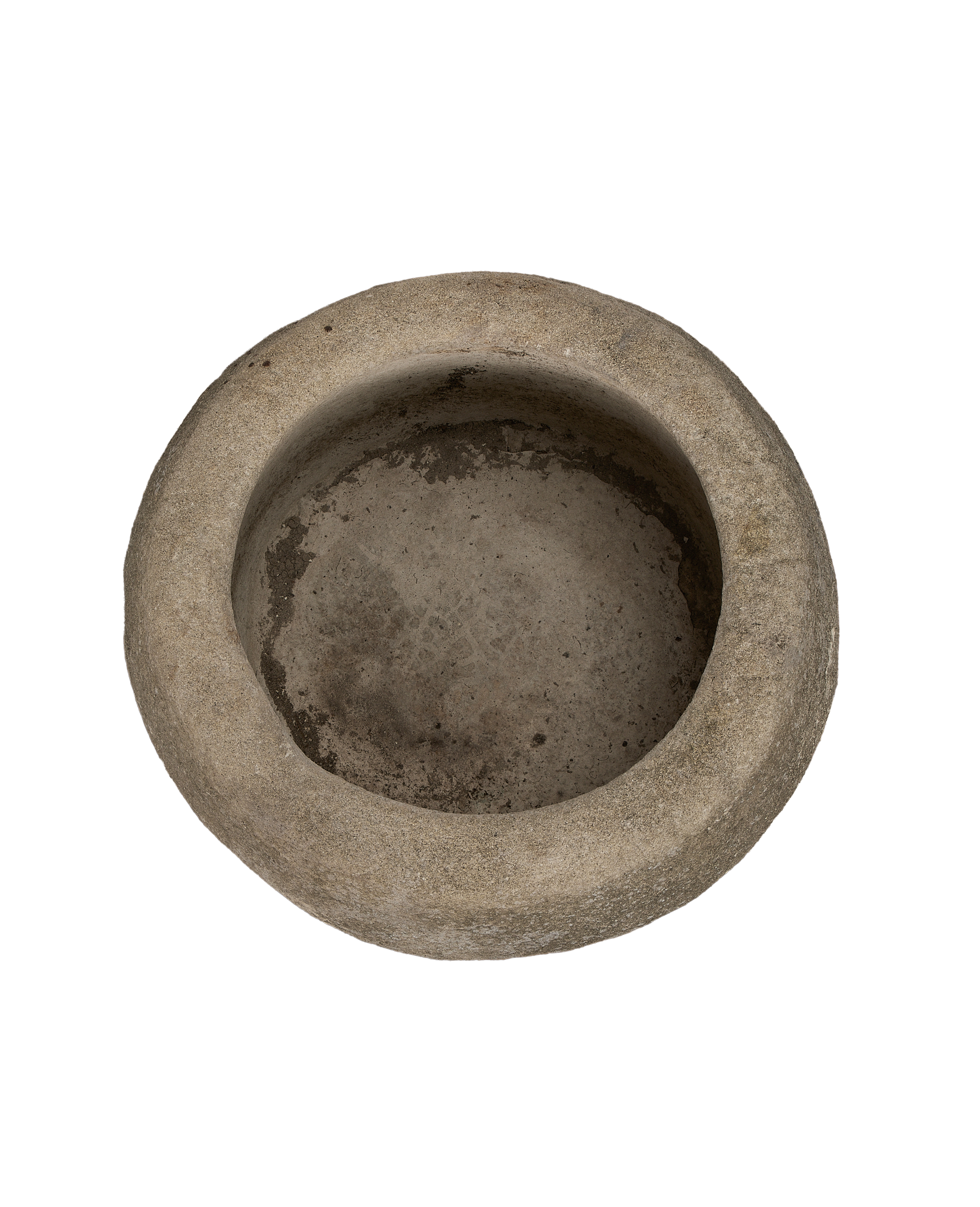 Vintage Indonesian round limestone trough, top-down view showing interior texture and edge details.