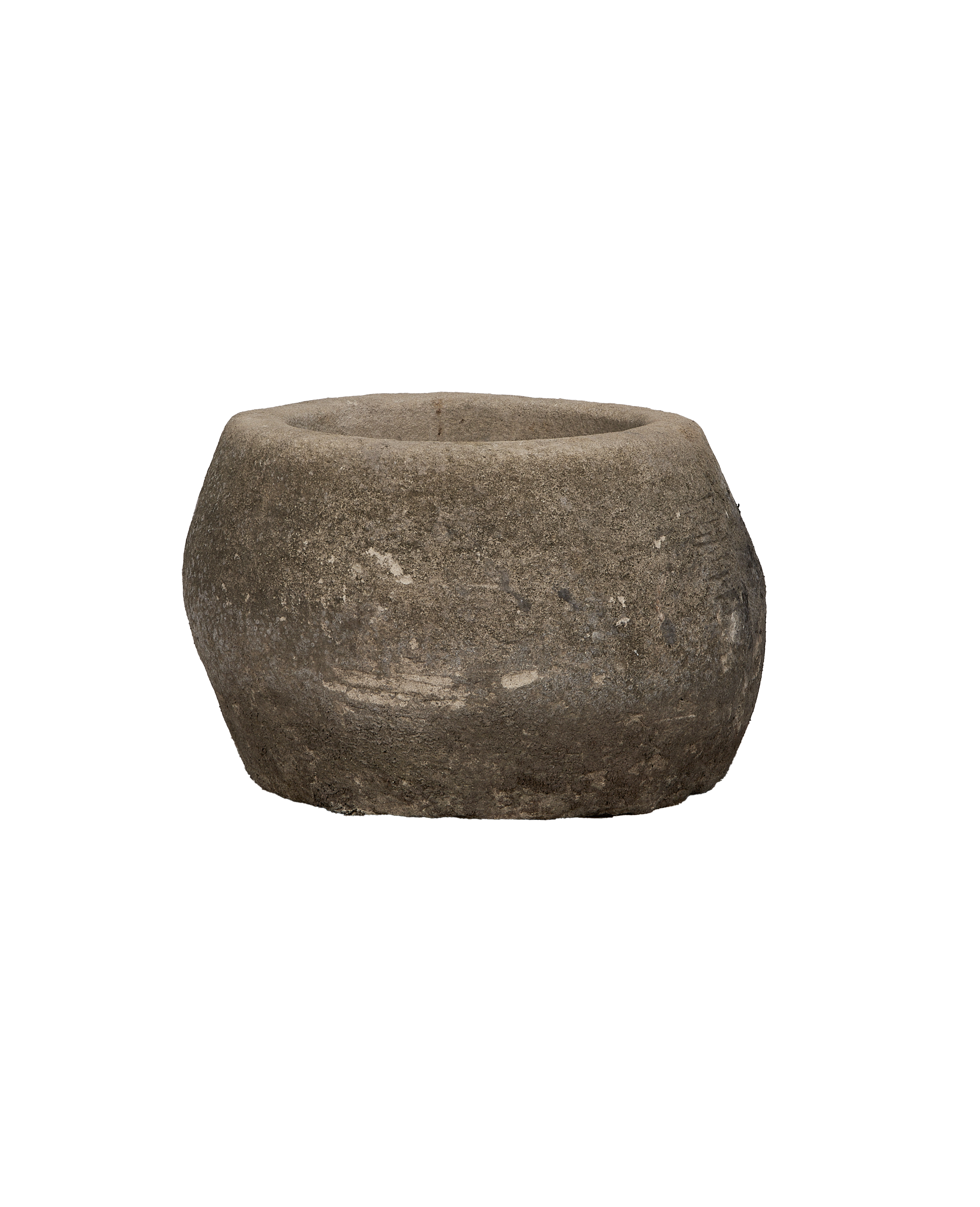 Vintage Indonesian limestone trough, round, showcasing natural, textured gray surface at eye-level.