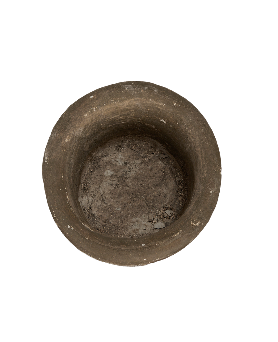 Vintage Indonesian round limestone trough, top view showing weathered interior texture and patina.