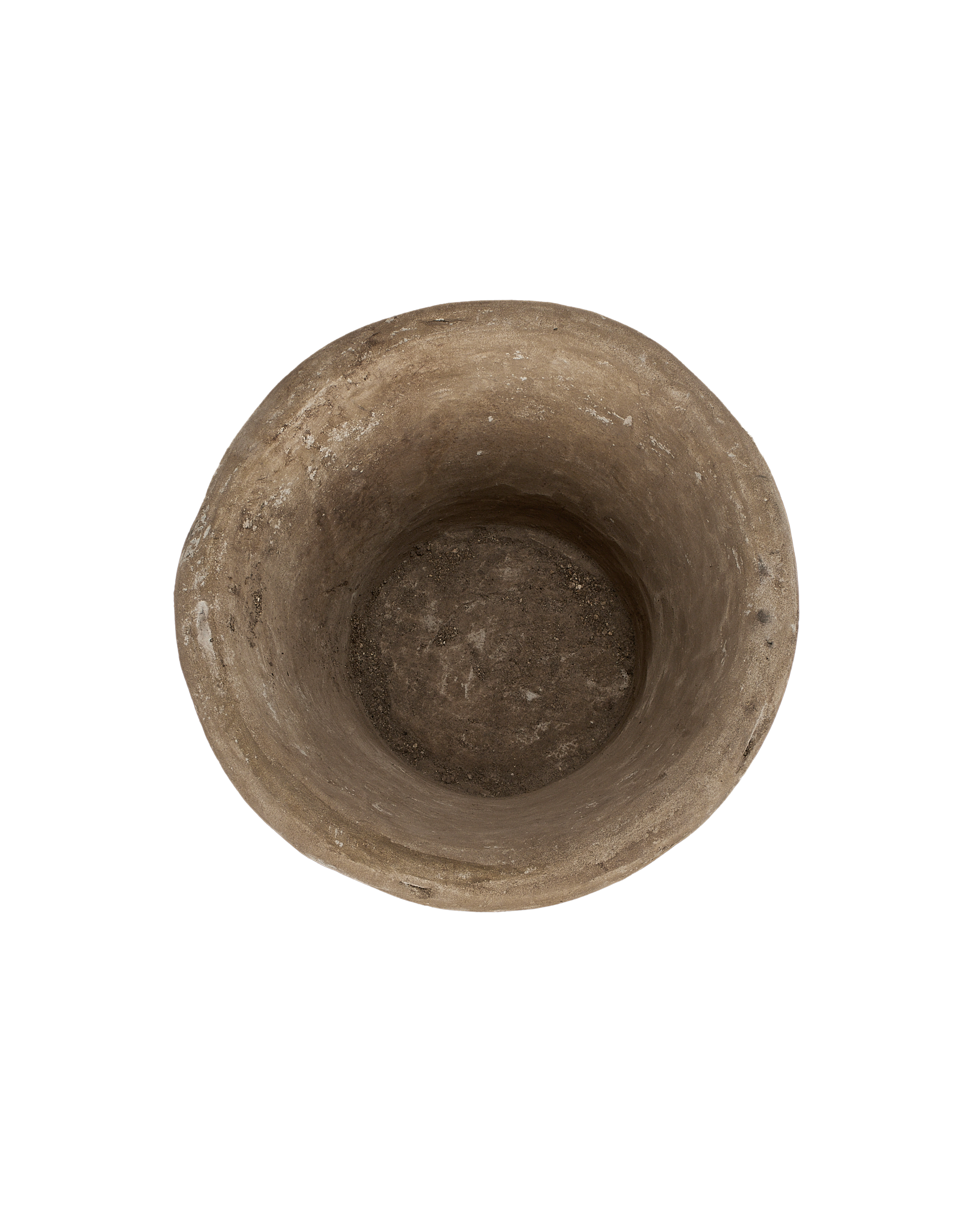 Vintage Indonesian round limestone trough, showing weathered interior surface and drainage hole.