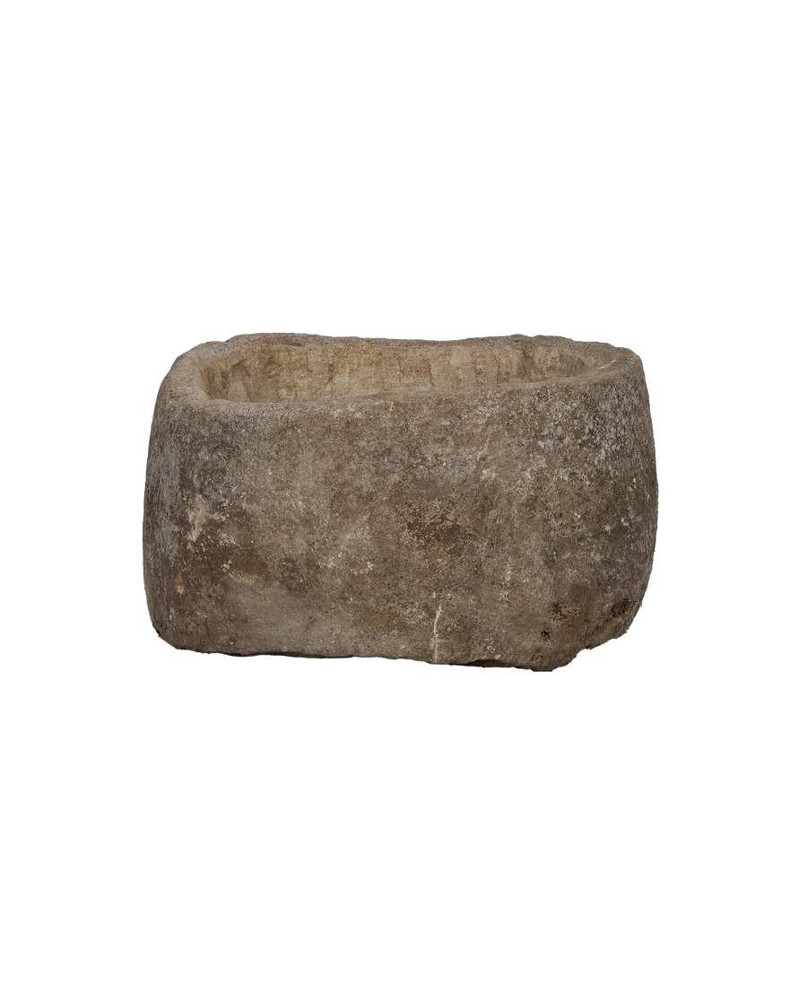 Vintage Indonesian limestone trough, top-down view showing weathered texture and natural wear.