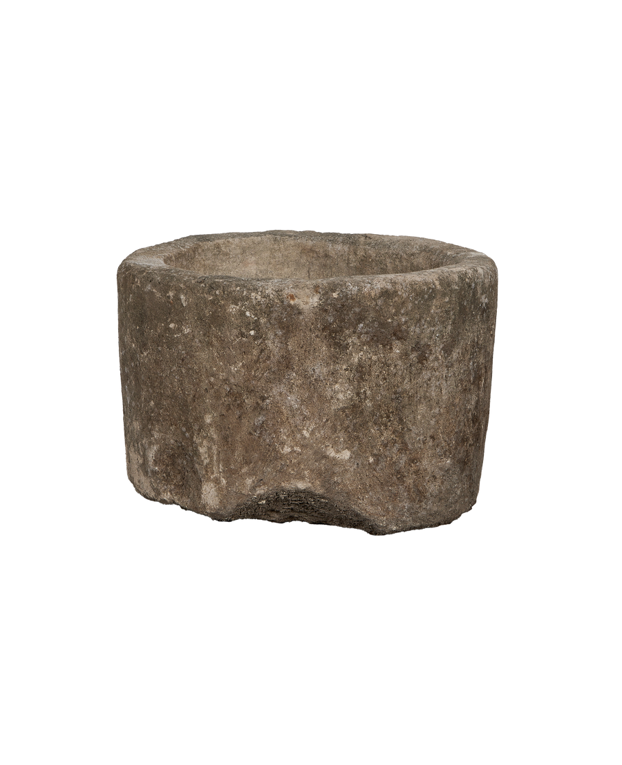 Vintage Indonesian limestone round trough from above, showing weathered texture and interior.