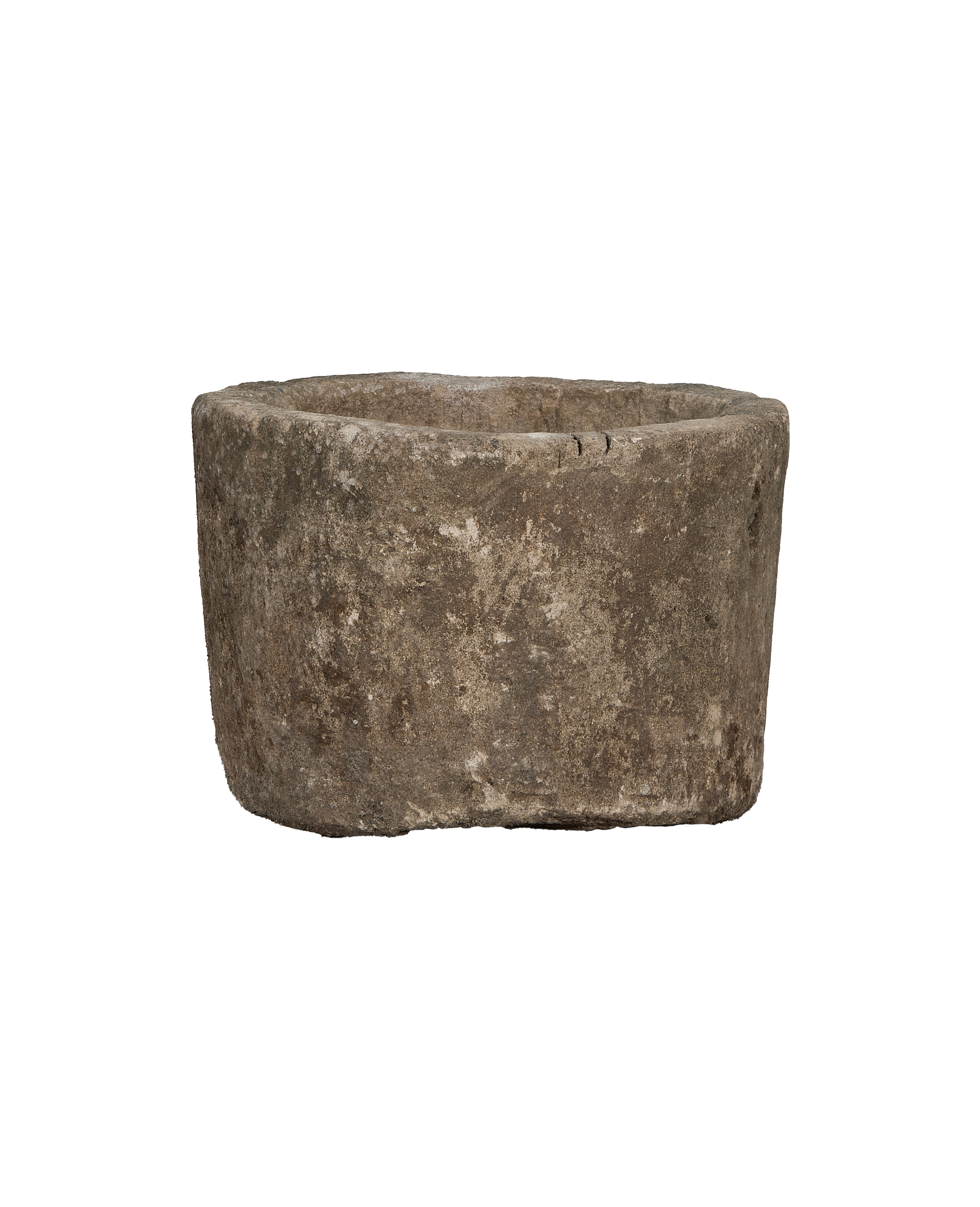 Vintage Indonesian round limestone trough, rich textured gray surface, full side view.
