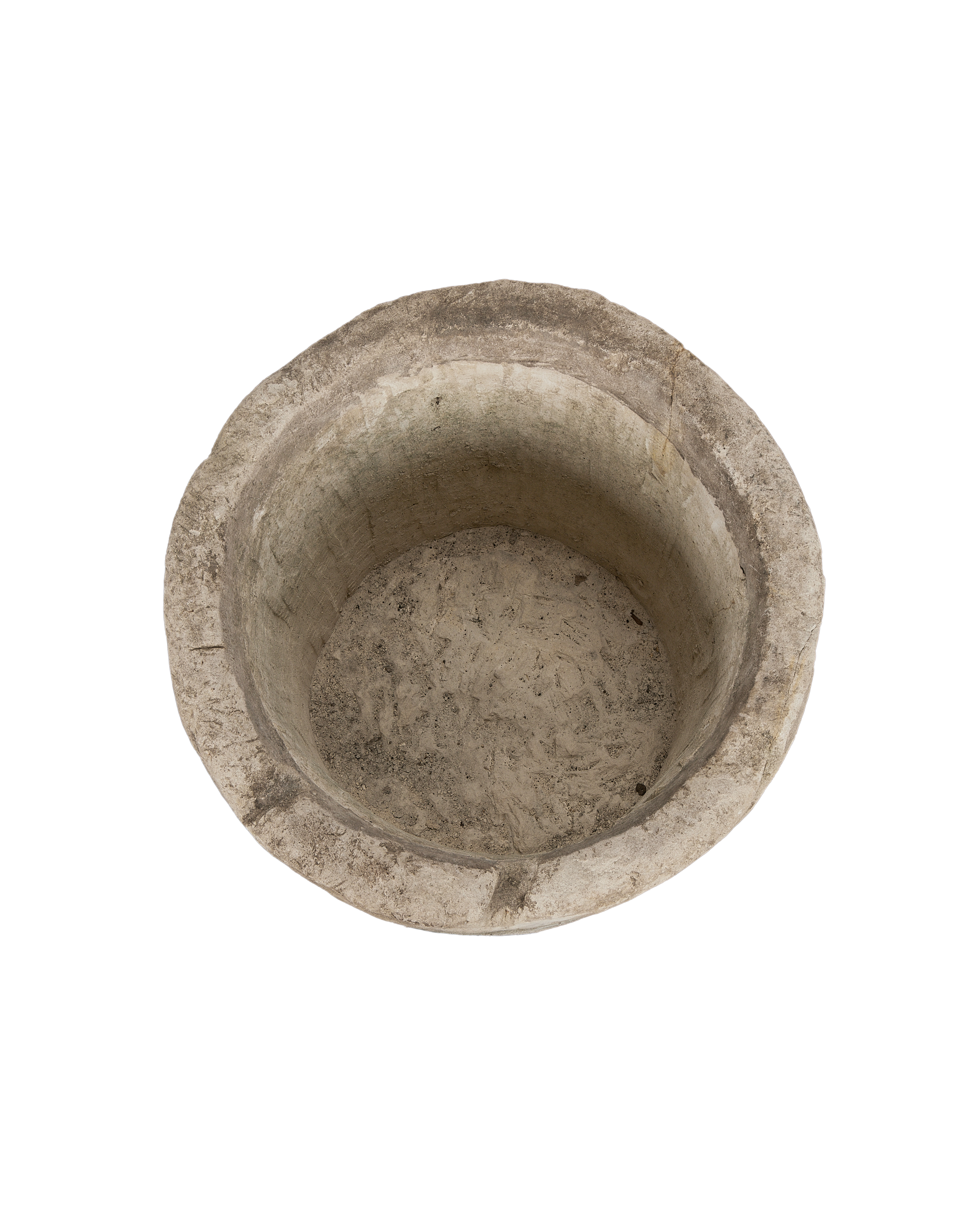 Vintage Indonesian round limestone trough, top view revealing rough interior texture and weathered edge.