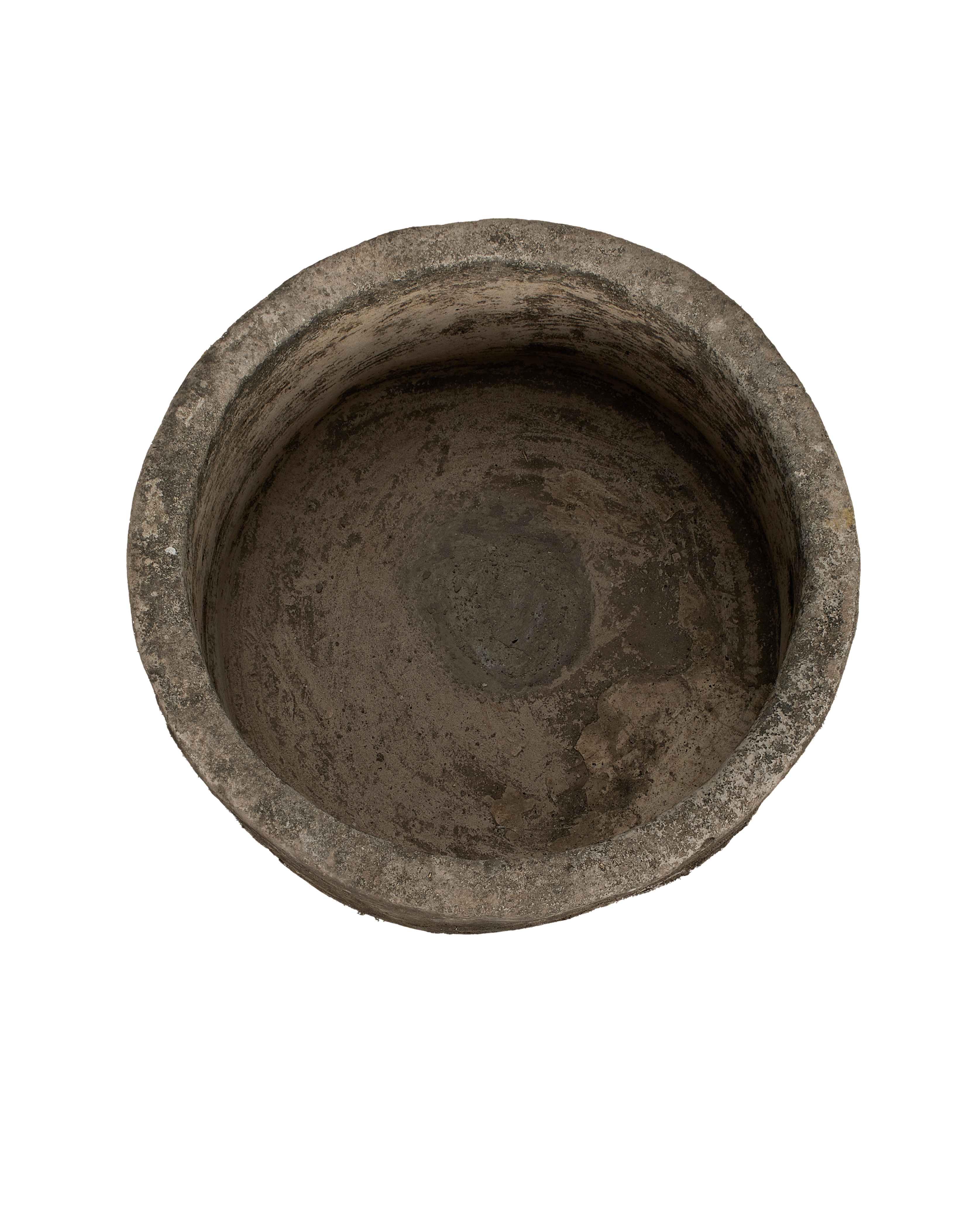 Vintage Indonesian round limestone trough, top-down view showing interior texture.