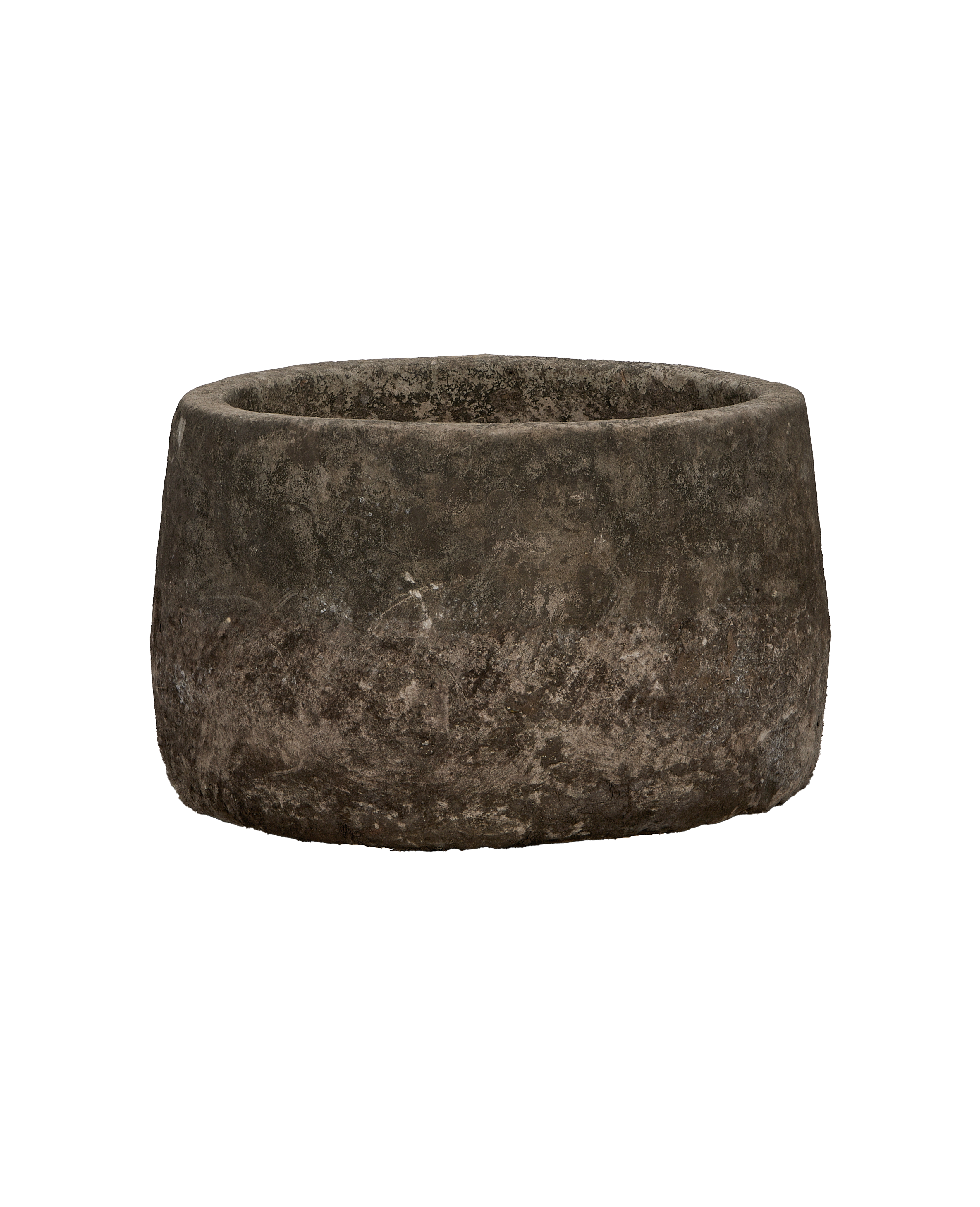 Vintage round Indonesian oak limestone trough, showing weathered texture from top-down perspective.