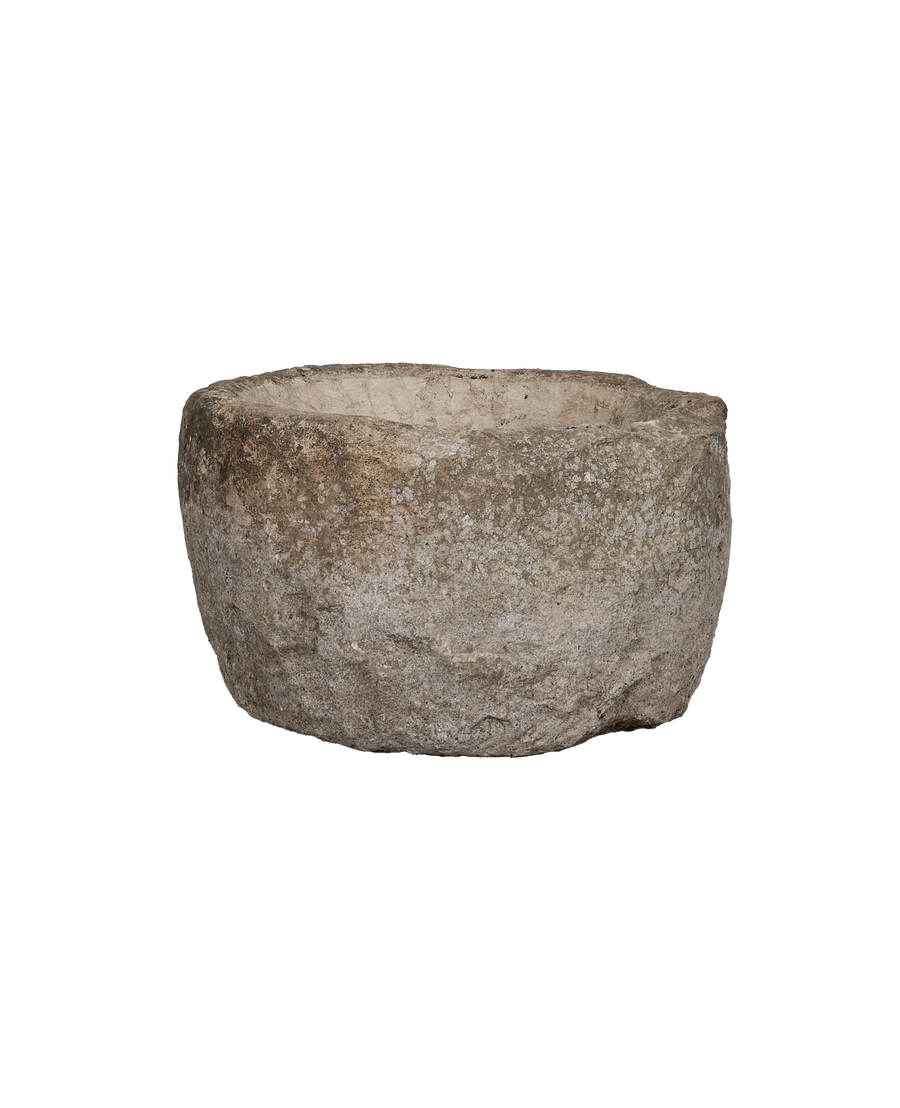 Vintage Indonesian limestone trough, top view showcasing weathered surface texture and oblong shape.