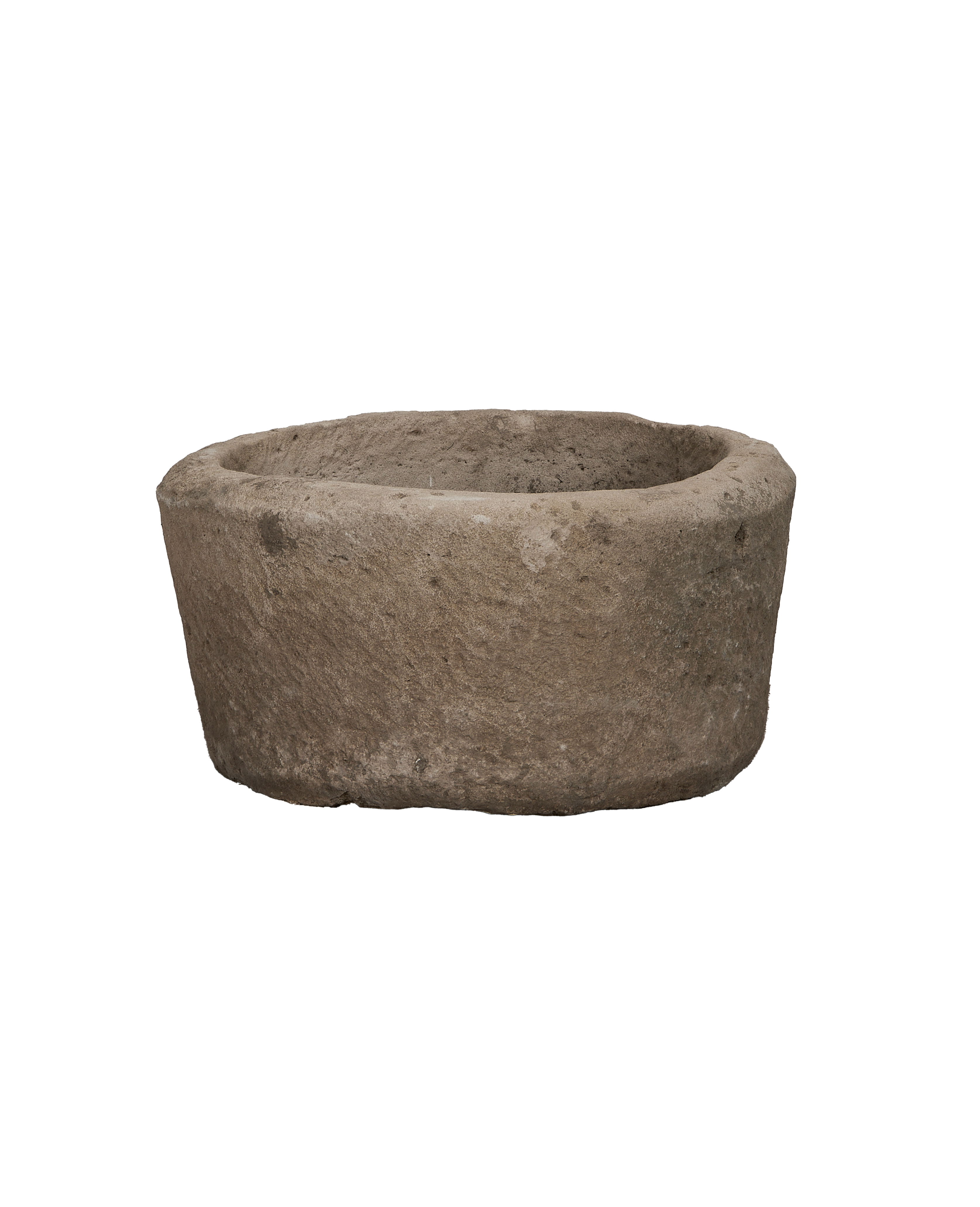 Vintage round limestone trough from Indonesia, showing rough texture and weathered finish.