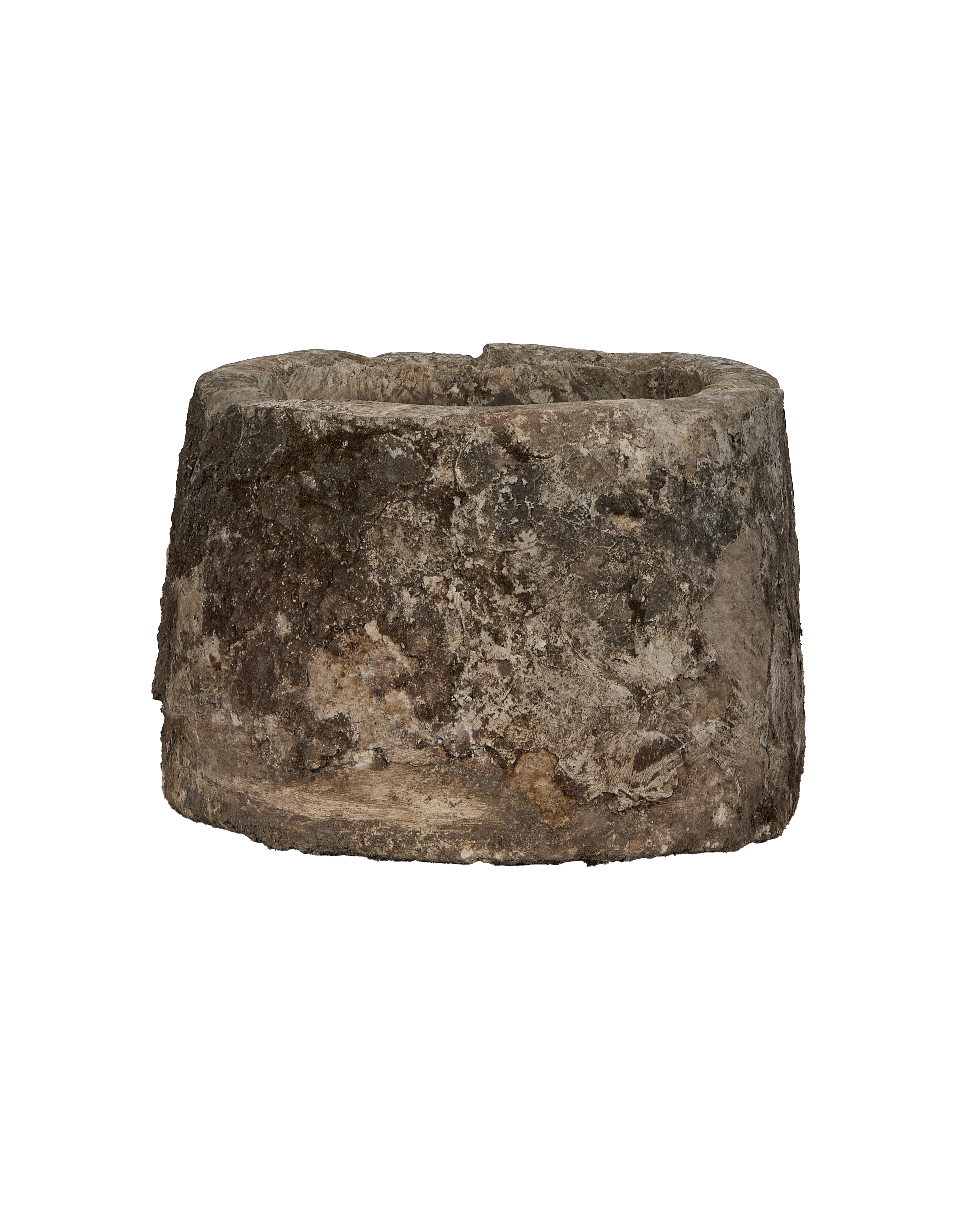 Vintage Indonesian round limestone trough, side view revealing rustic texture and weathered surface.