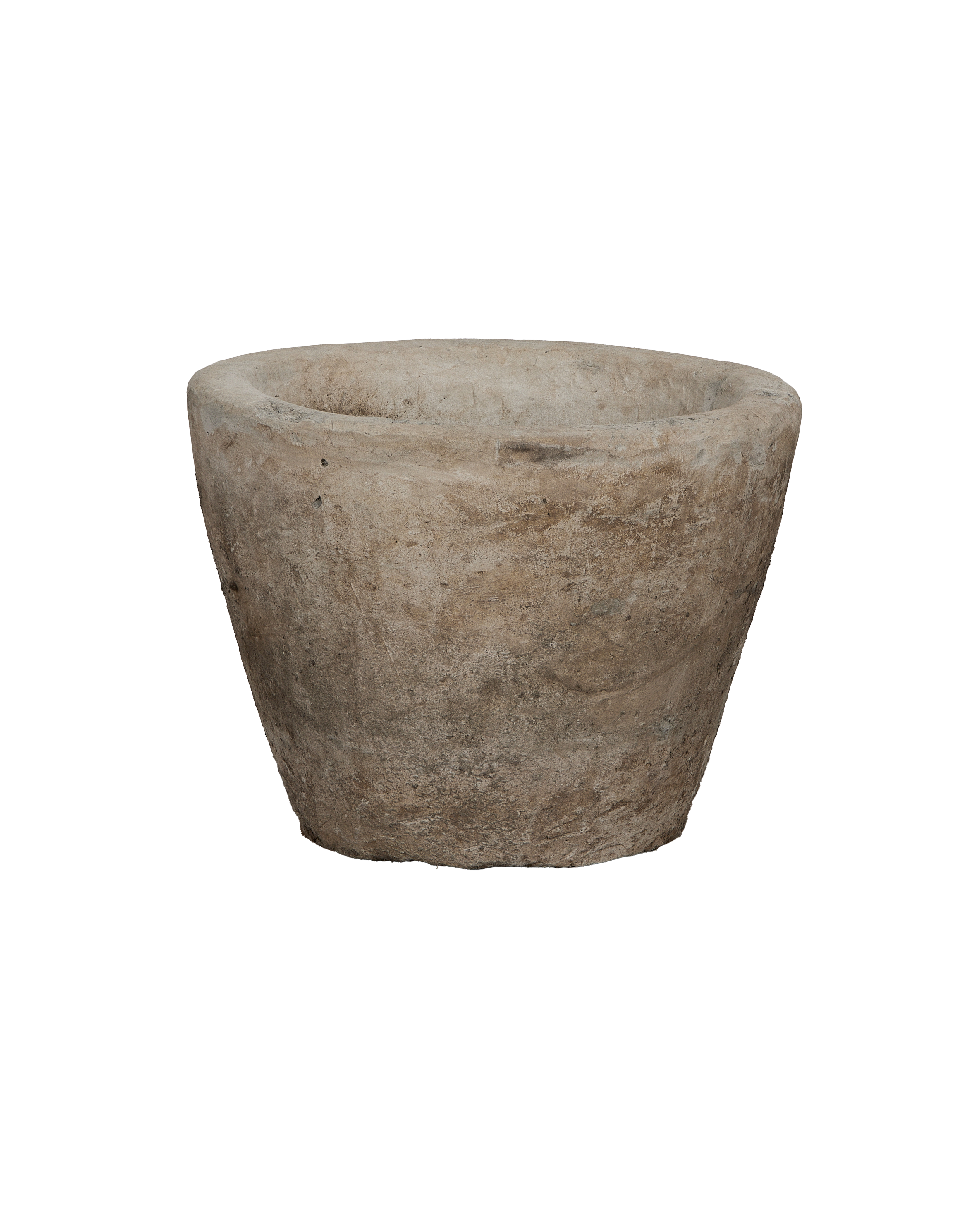 Vintage Indonesian limestone garden trough from a slightly elevated side view, showcasing its conical shape.