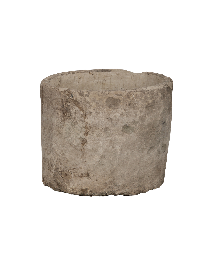 Vintage round limestone trough, rich Indonesian provenance, showing authentic weathered surface textures.