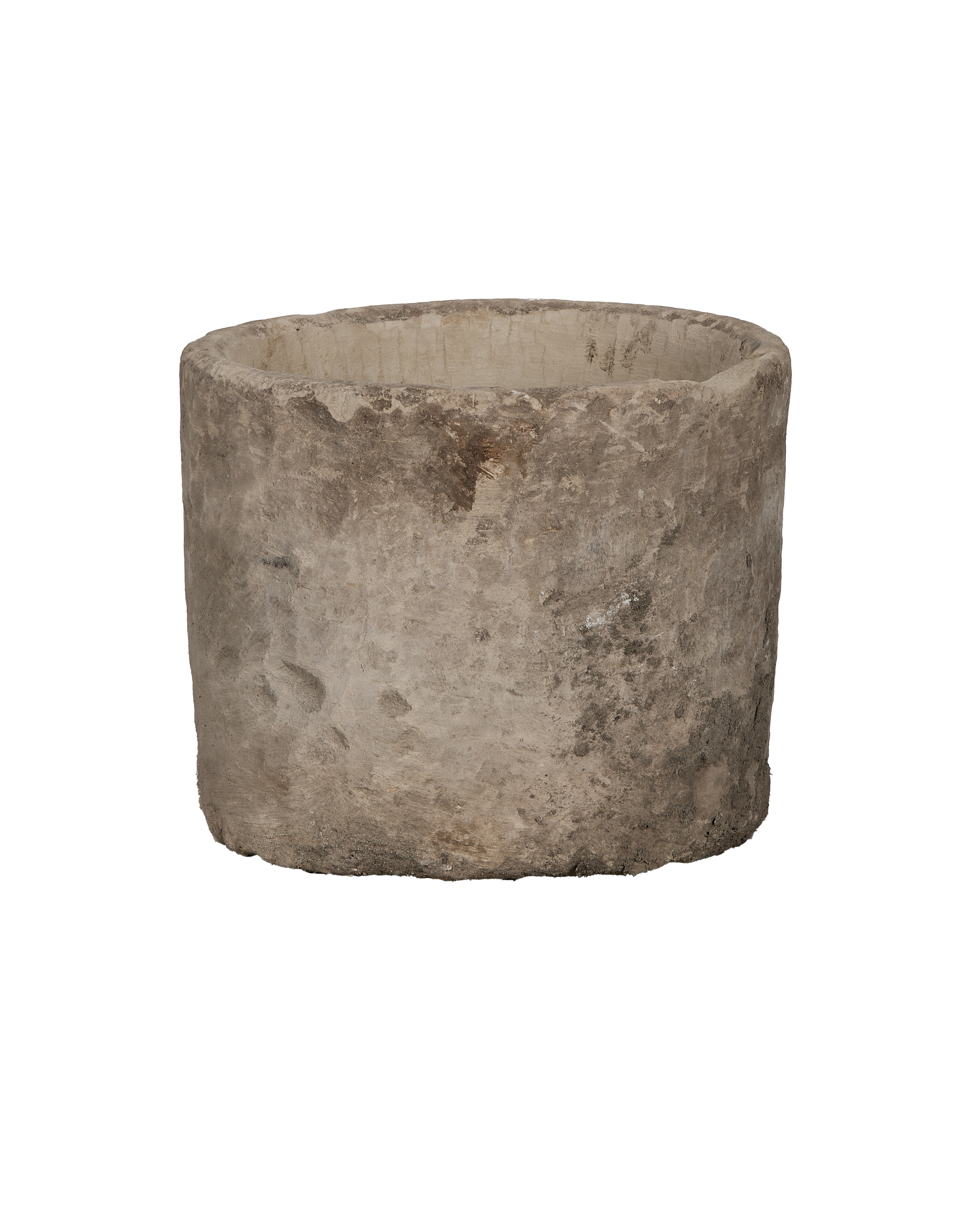 Vintage round Indonesian limestone trough, showing weathered texture from an elevated angle.