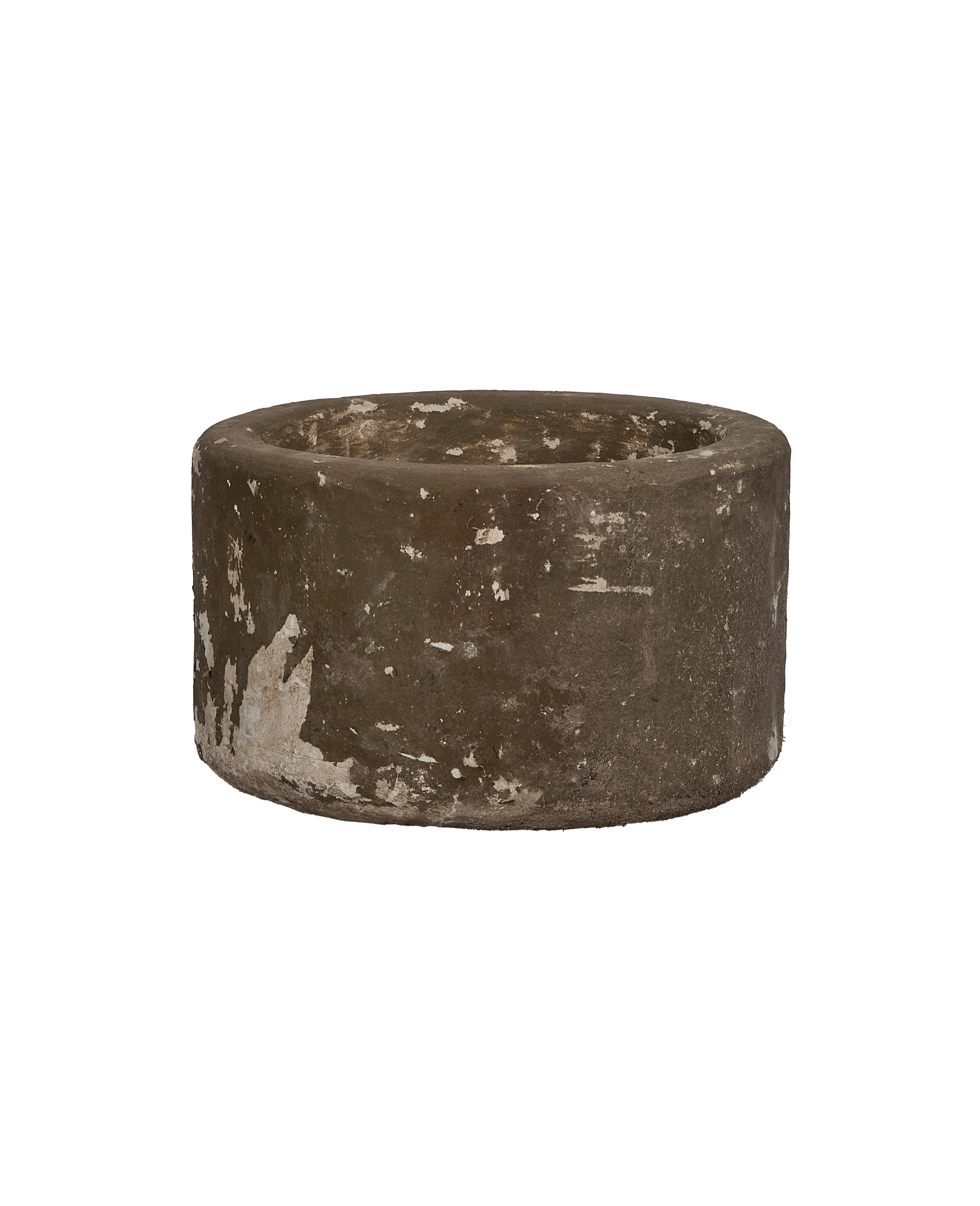 Vintage round limestone trough, aged patina, white remnants, Indonesian antique, side view.