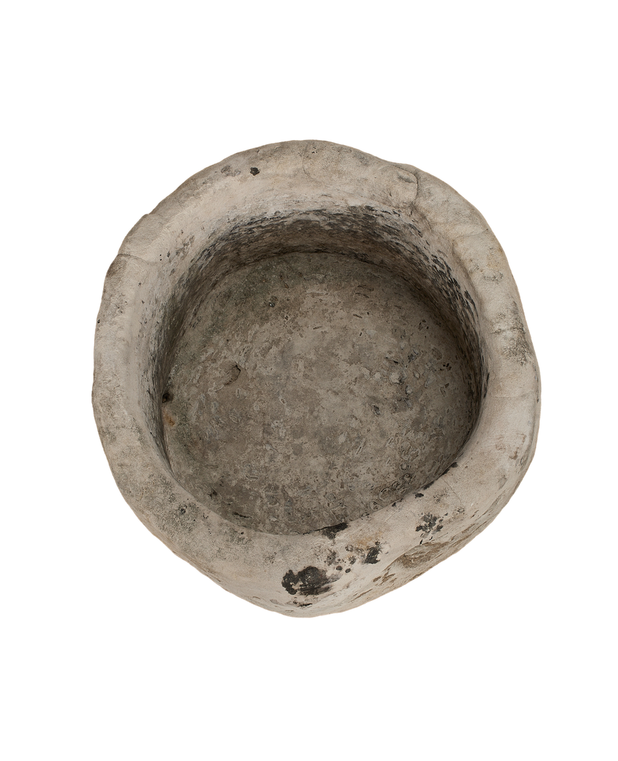Vintage Indonesian limestone trough, top-down view showing deep basin, textured patinated surface.