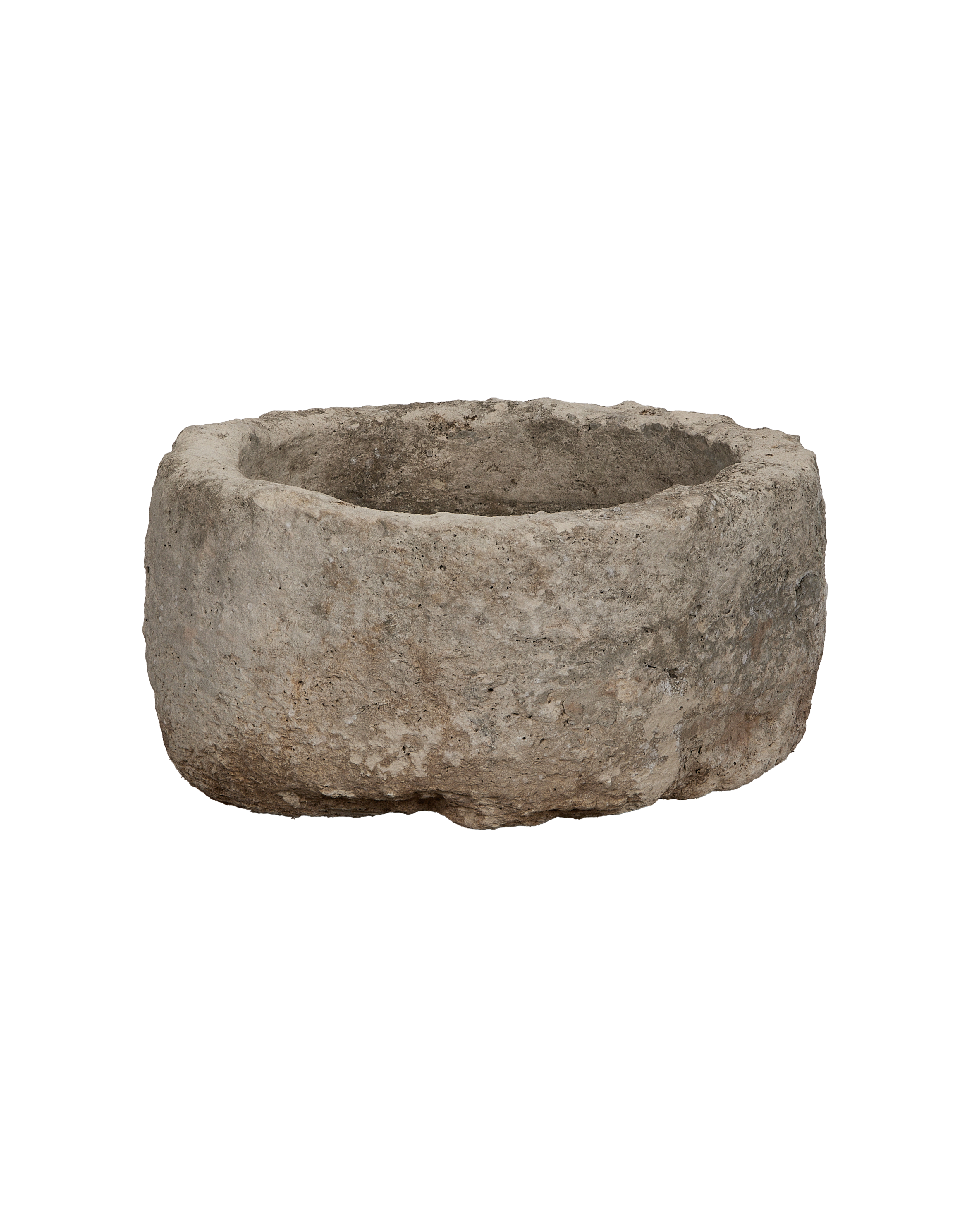 Vintage round limestone trough from Indonesia, showcasing weathered surface texture and interior details.