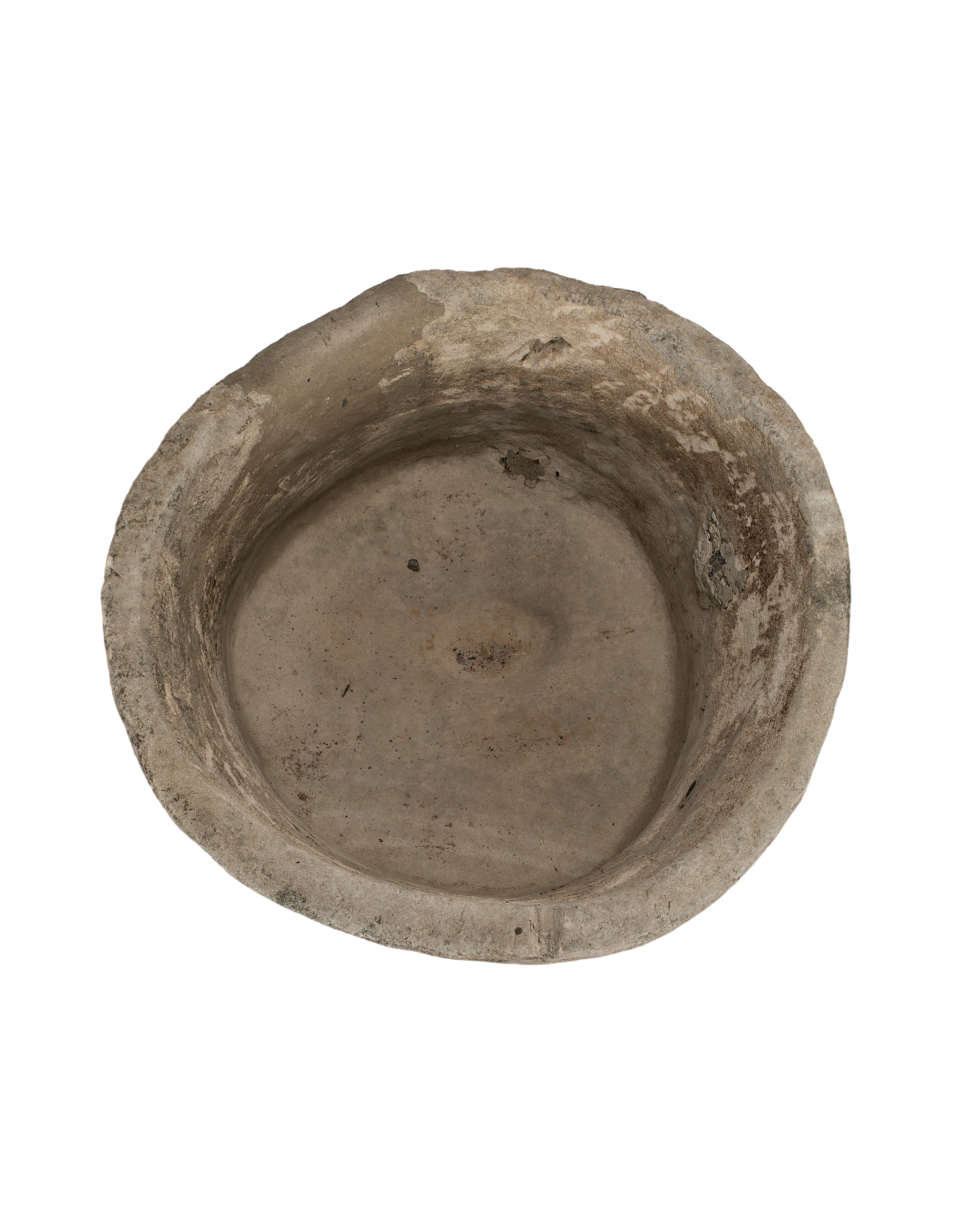 Vintage Indonesian round limestone trough, top-down view showing interior depth and rough texture.