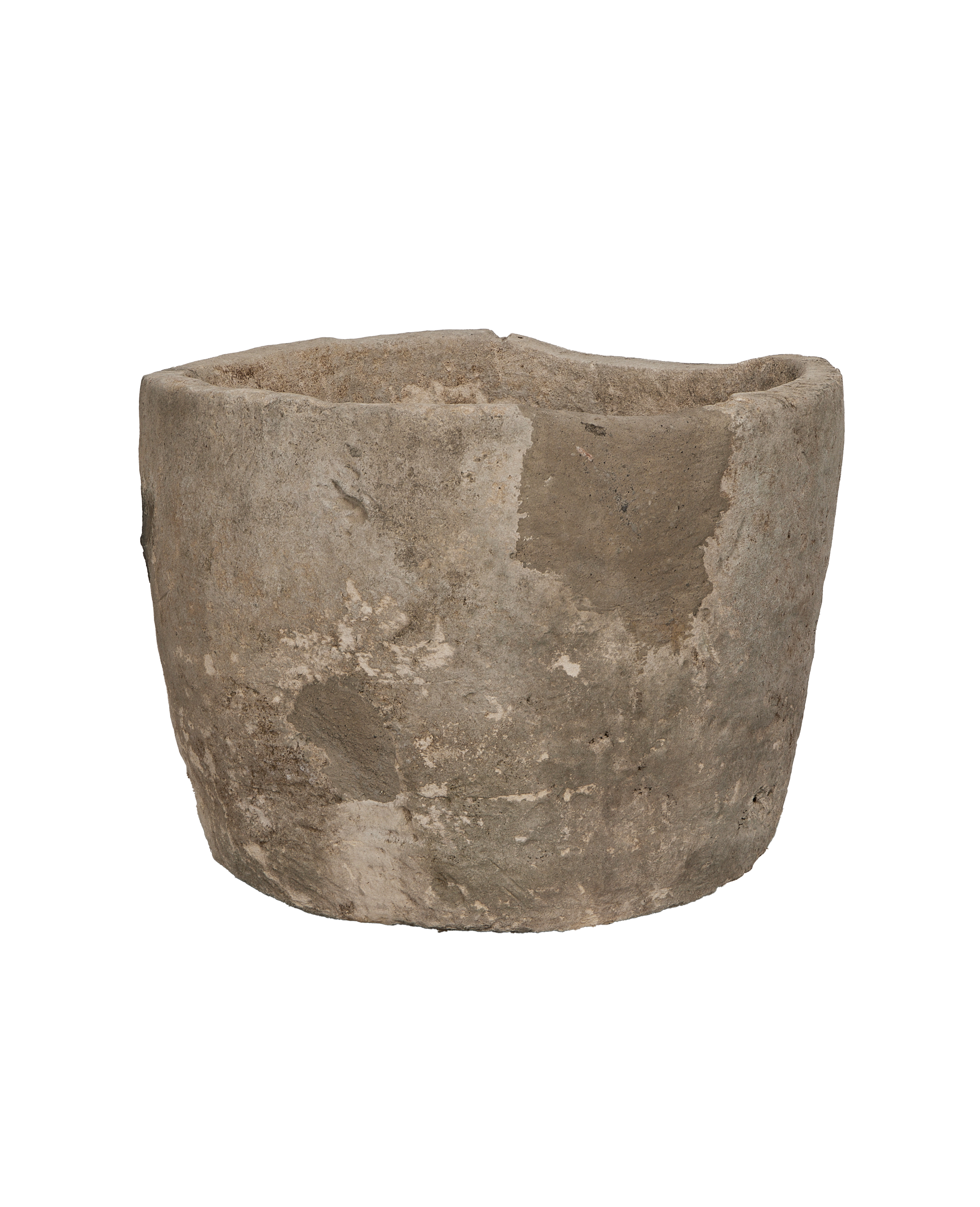 Vintage Indonesian round limestone trough, close-up of textured exterior with variations.