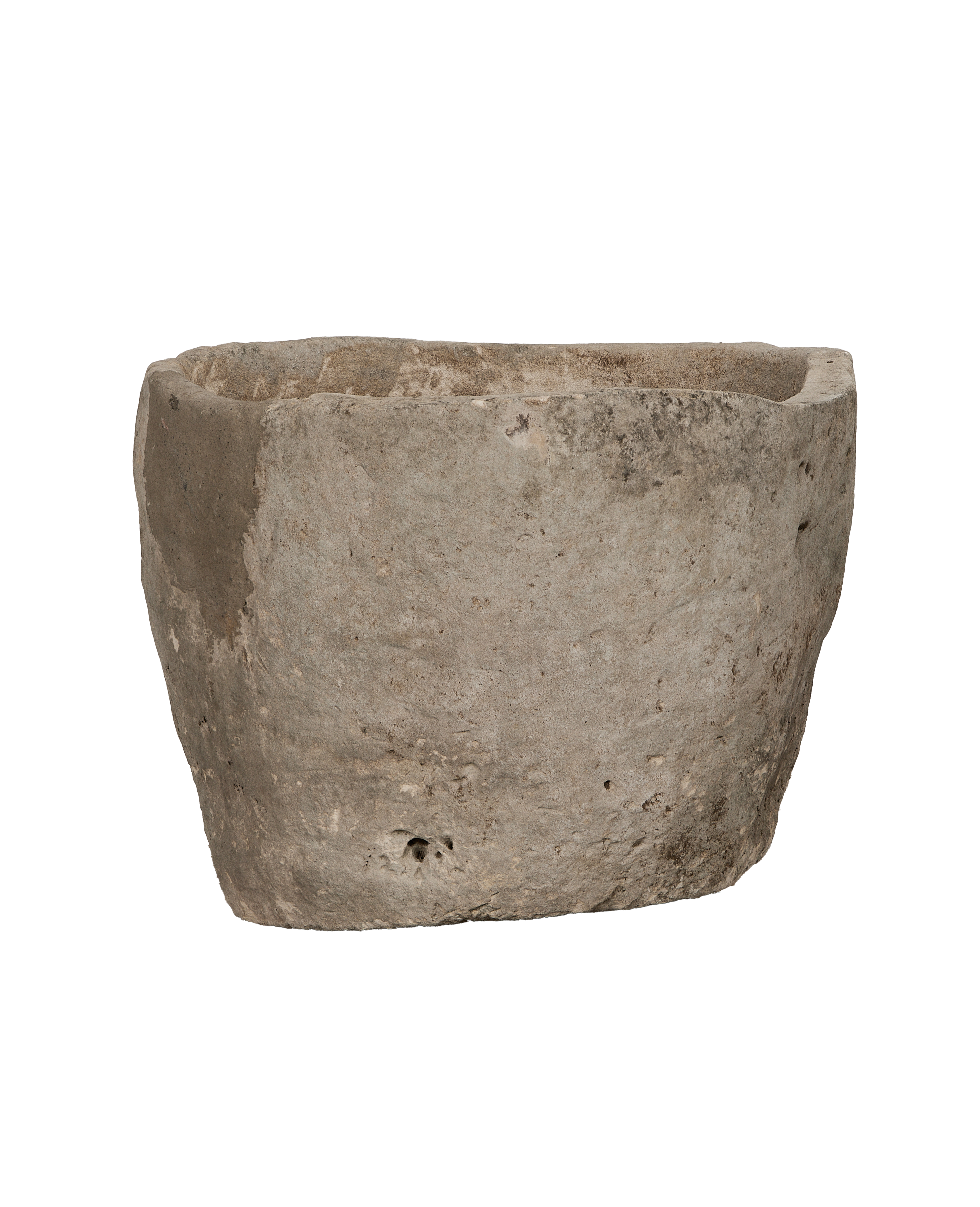 Vintage Indonesian limestone trough closeup, showcasing textured surface and naturally weathered patina.