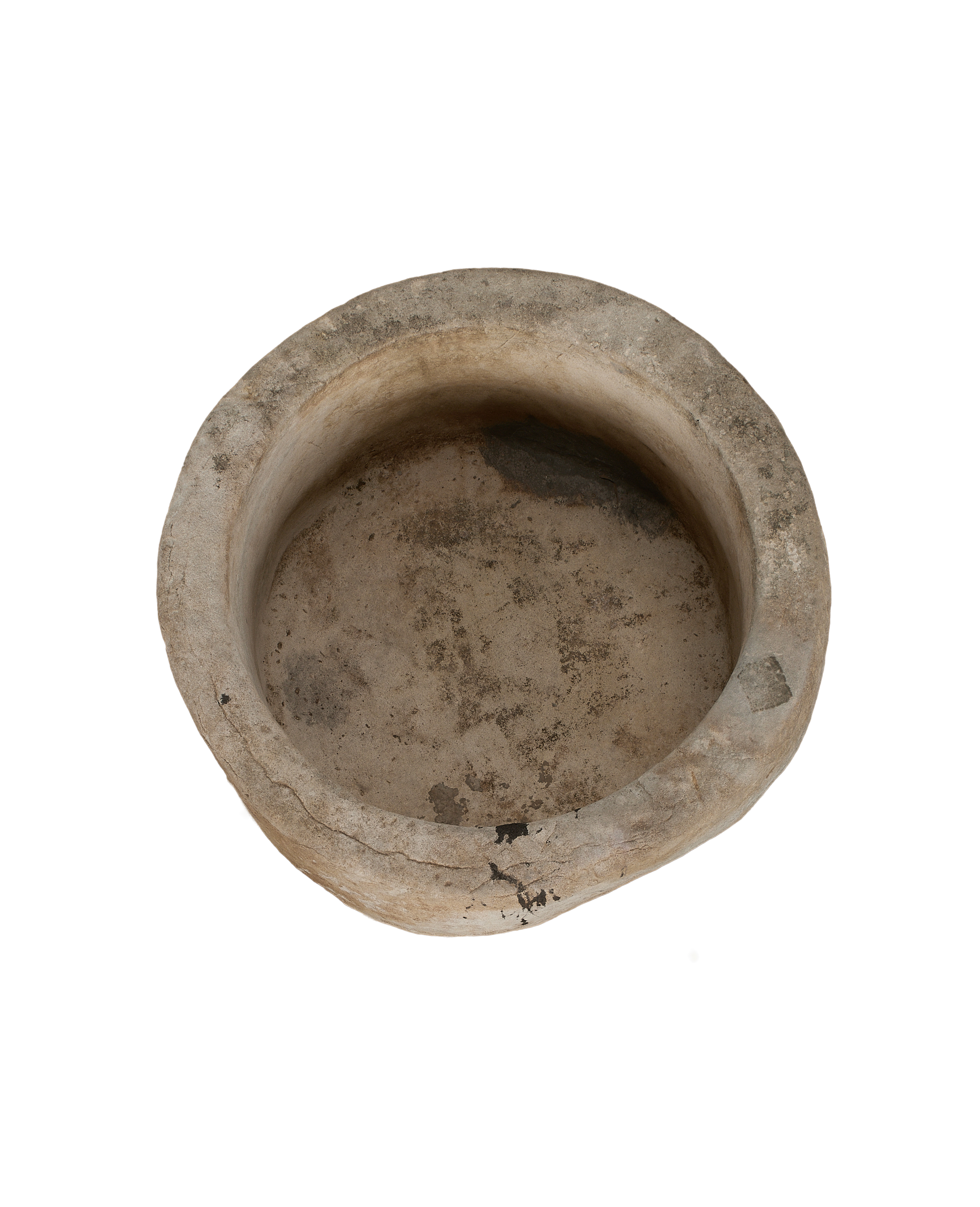 Vintage Indonesian limestone trough viewed from above, showcasing distressed surface and interior texture.