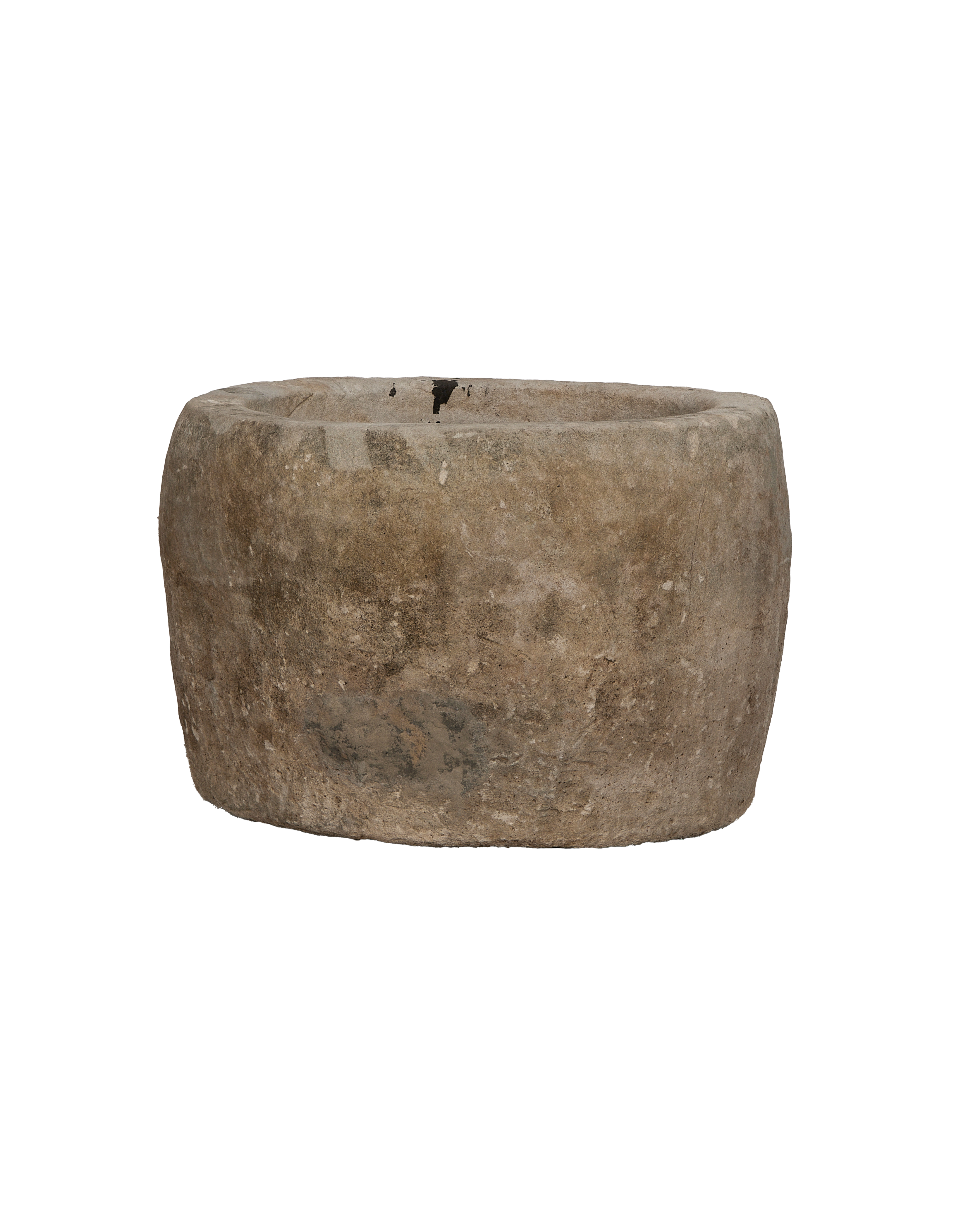 Vintage Indonesian round limestone trough, showing weathered texture and small rim imperfections on black.