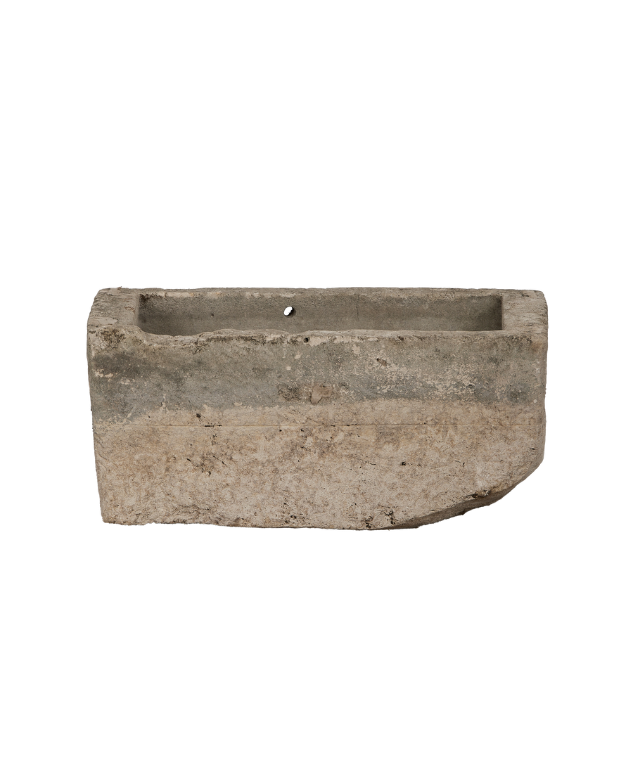 Vintage Indonesian limestone trough, rectangular, showcasing worn texture and upper drainage hole.