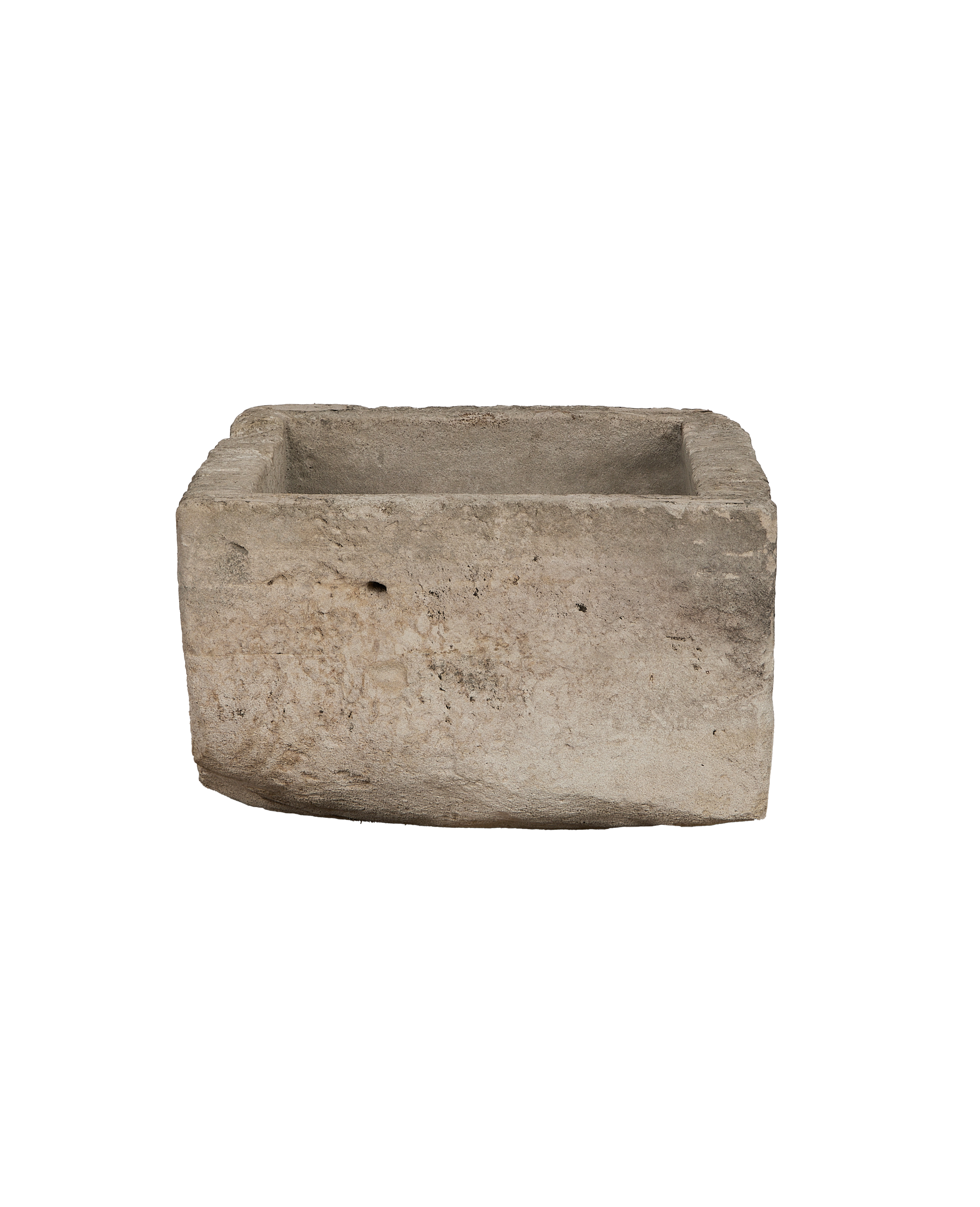 Vintage rectangular limestone trough, showing the rugged, textured exterior and aged patina from Indonesia.