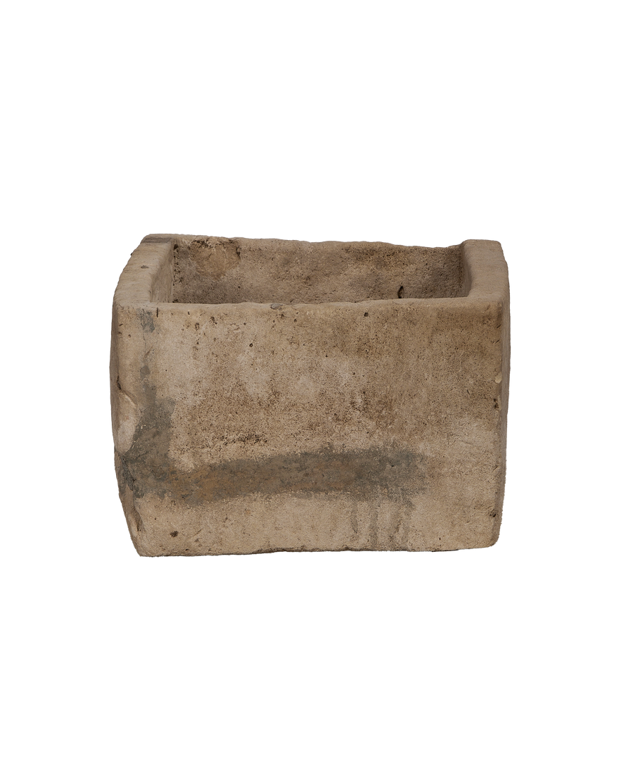 Vintage Indonesian limestone trough, rectangular, from upper side view.