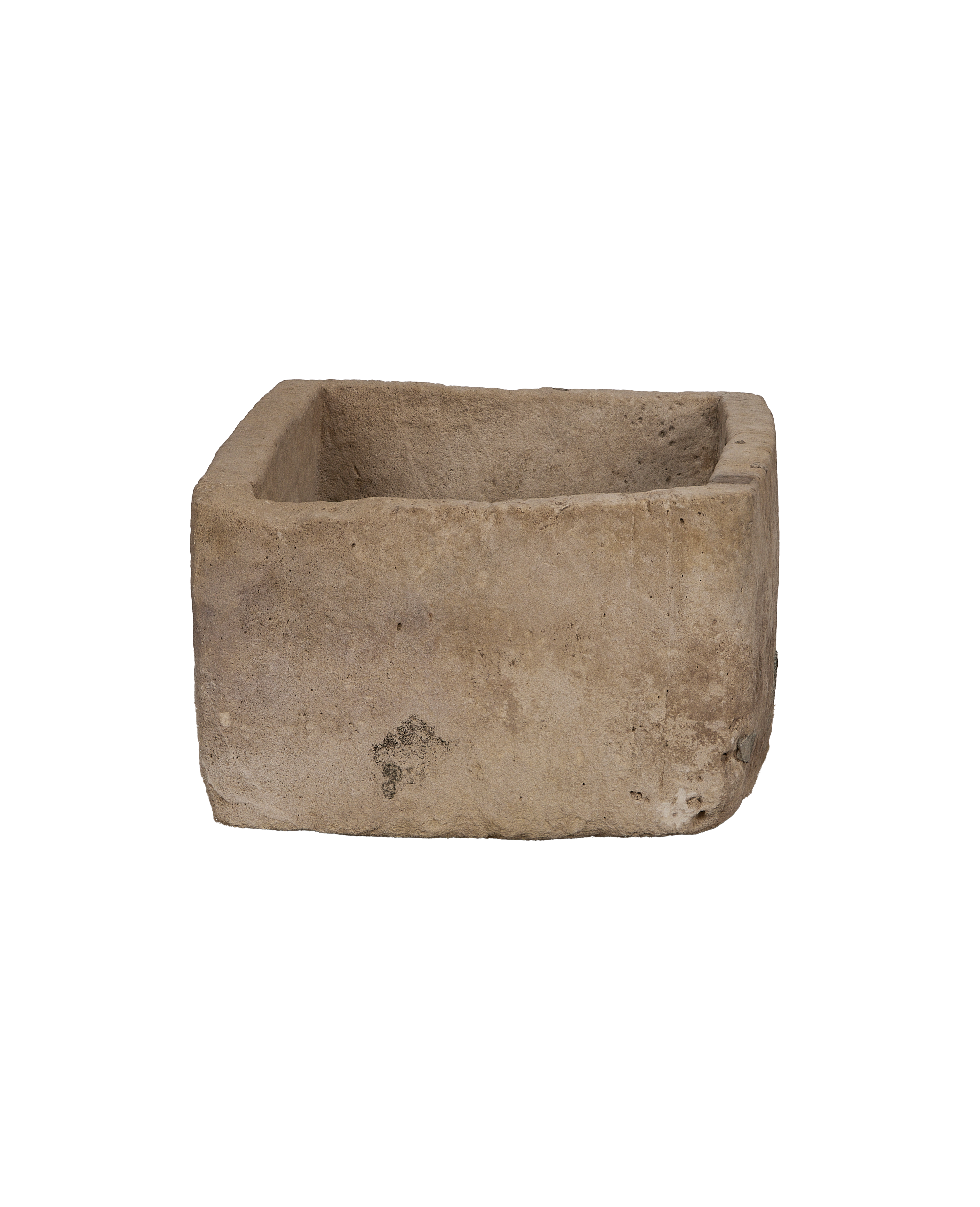Vintage rectangular limestone trough, showing rough-cut bottom edge and weathered surface texture.
