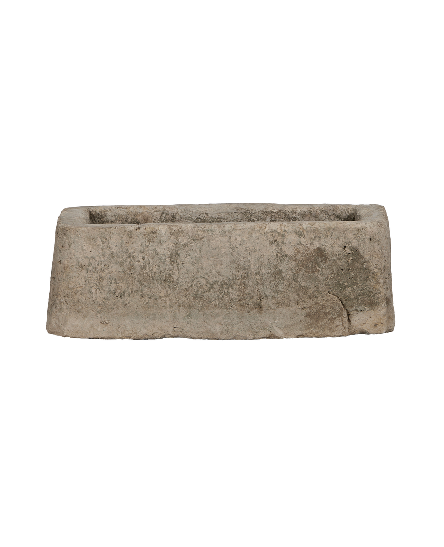 Vintage Indonesian limestone trough, rectangular, with textured surface and weathered crack shown from the side.