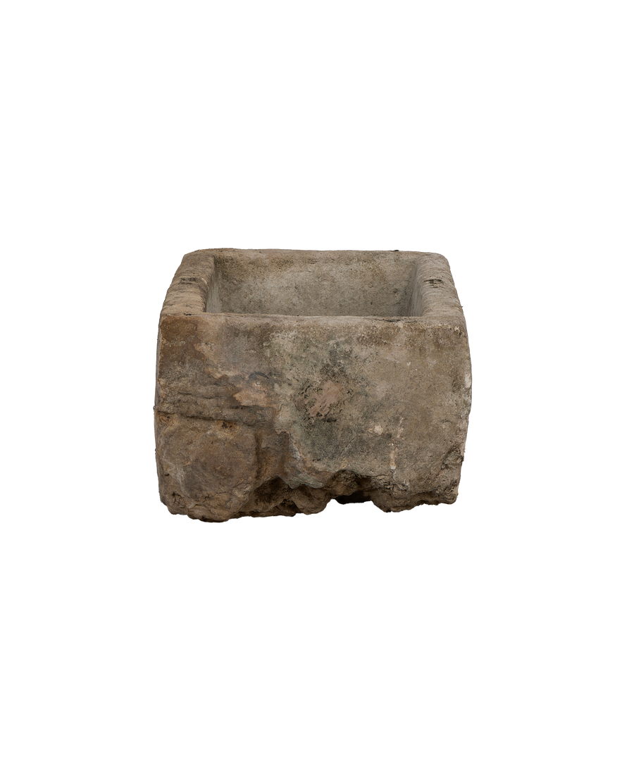 Vintage Indonesian rectangular limestone trough, side view revealing rustic texture and antique patina.