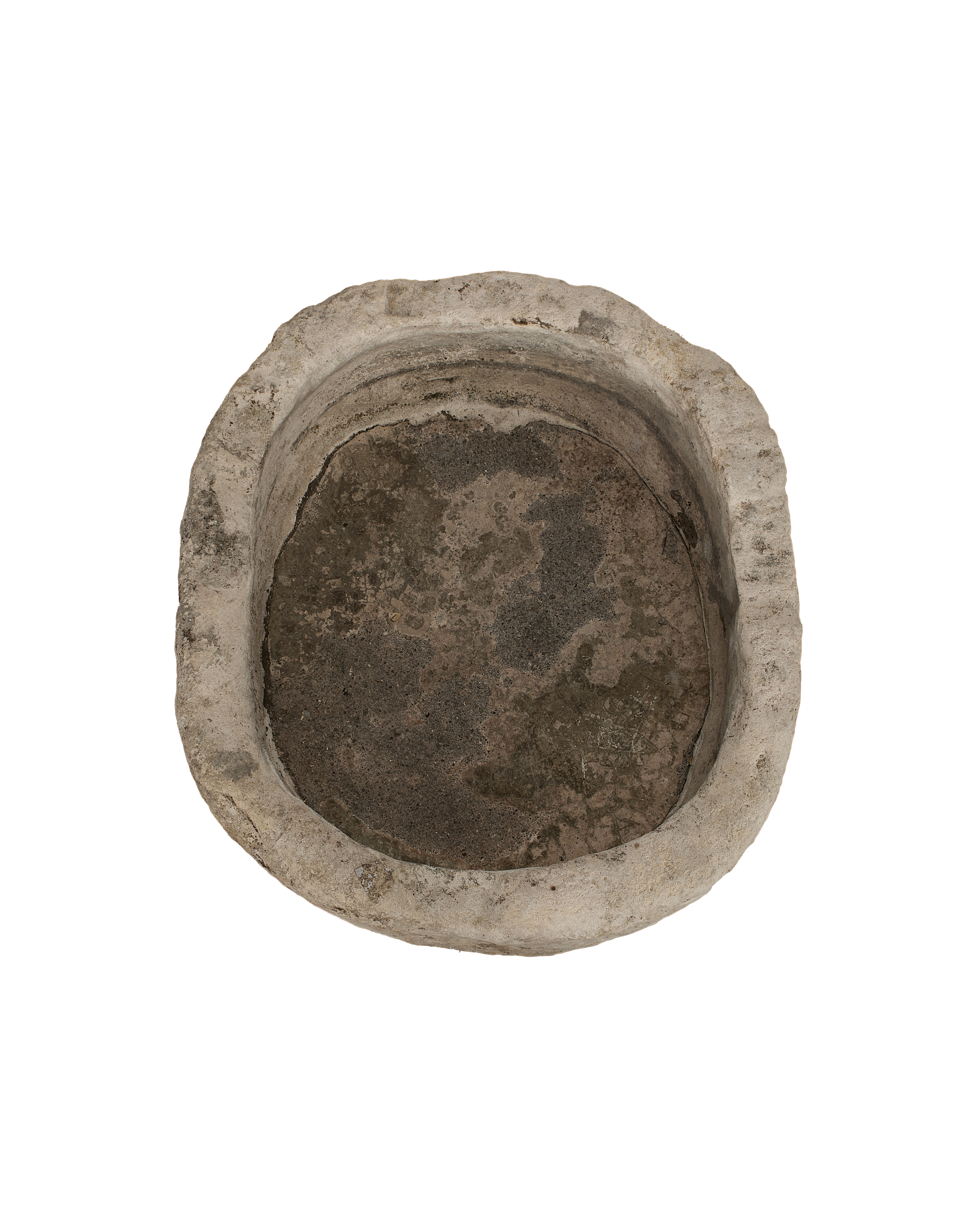 Vintage limestone trough from Indonesia, top view showing weathered, oblong interior.