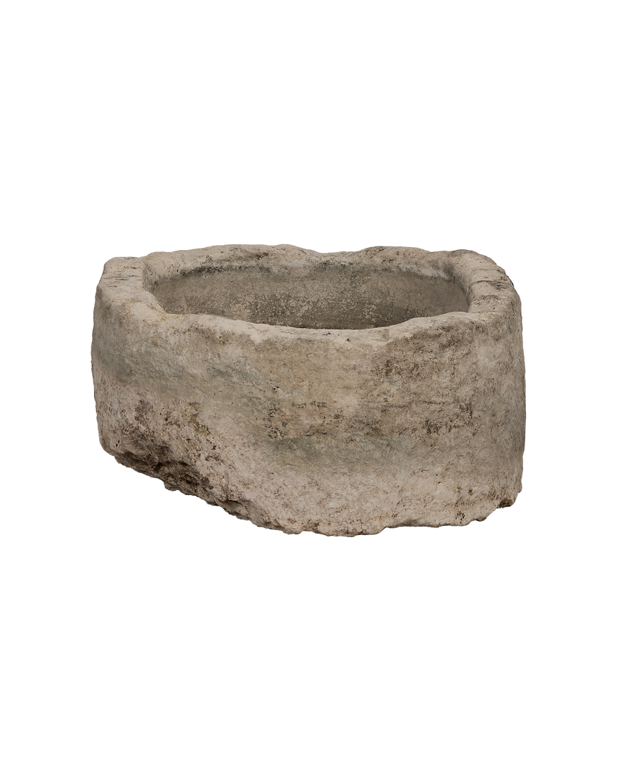 Vintage OAK limestone trough from Indonesia, weathered oblong planter, angled view.