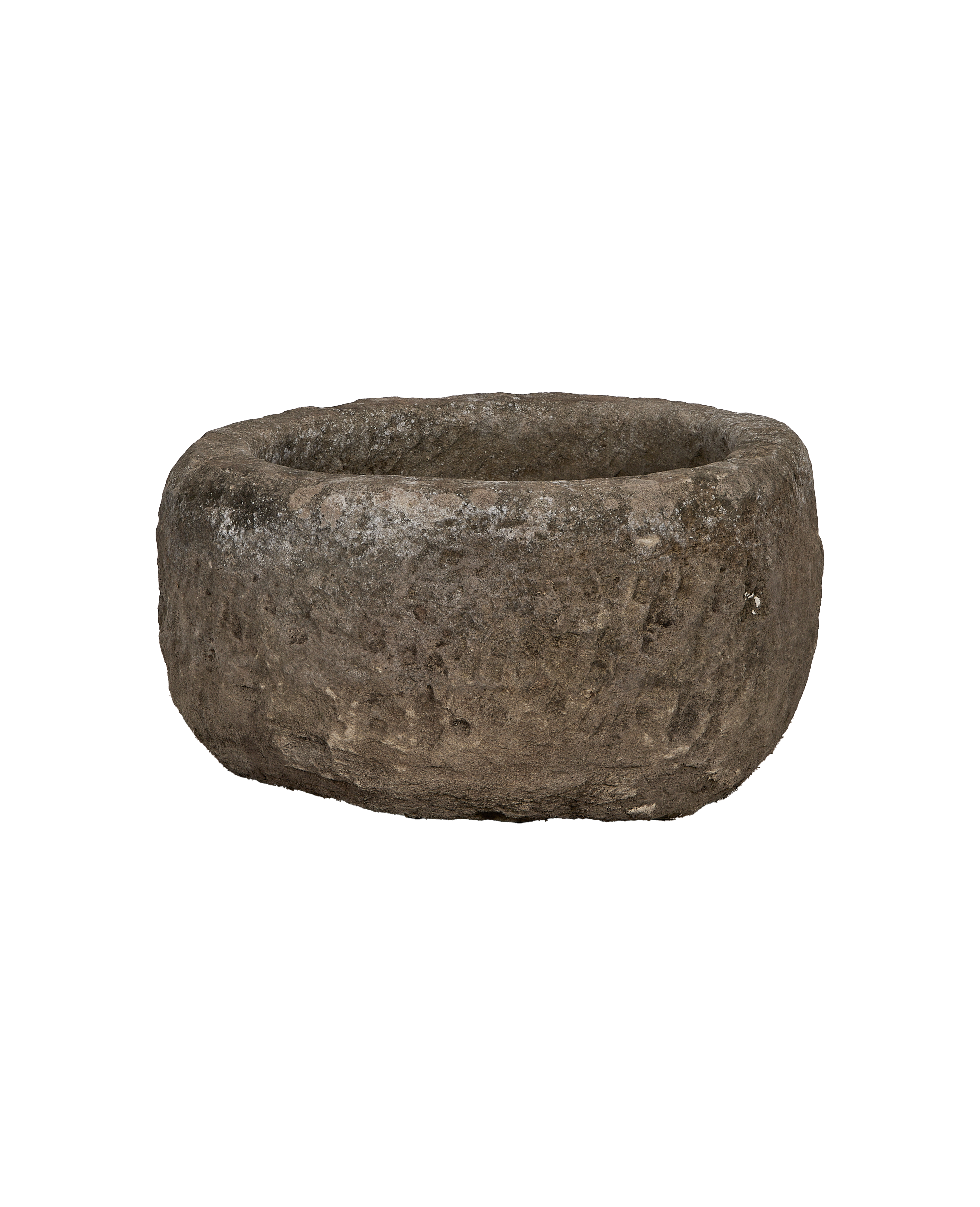 Vintage Indonesian limestone trough, round, showcasing rough textured surface with natural imperfections.