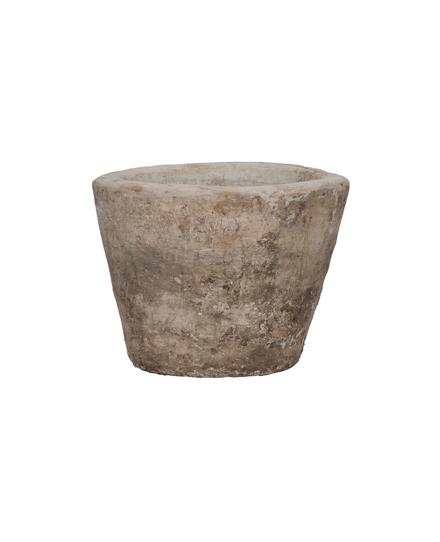 Vintage round limestone trough, full front view, showing textured surface.