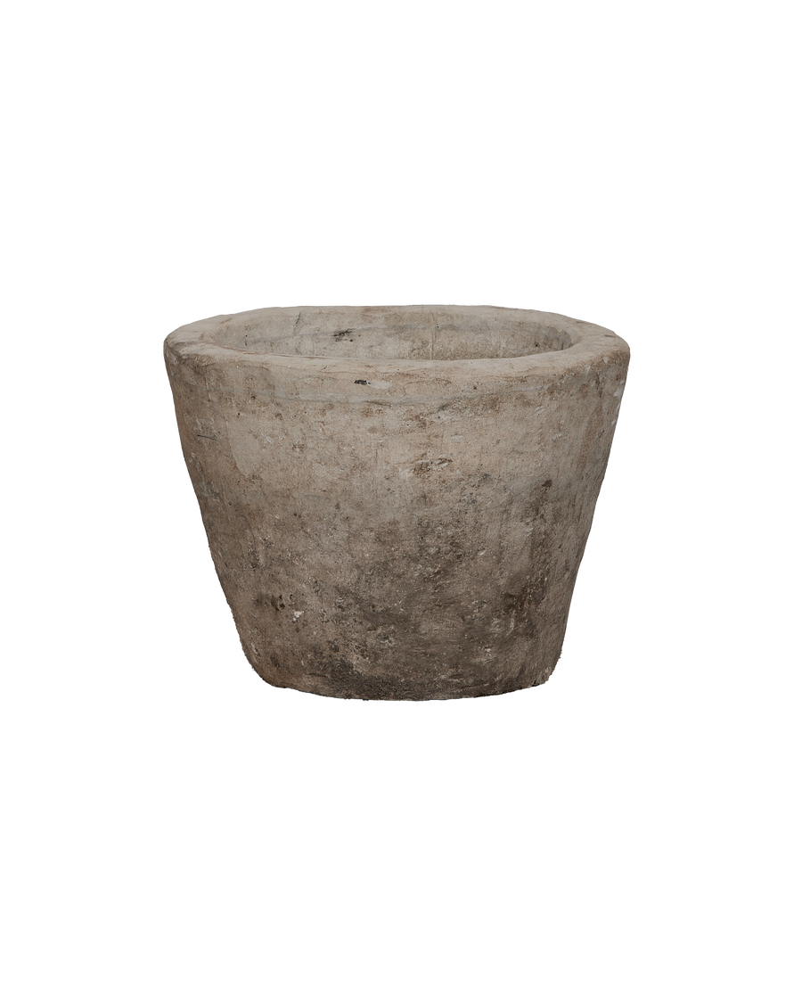 Vintage round limestone trough, Indonesian origin, showcasing weathered texture and rim detail.