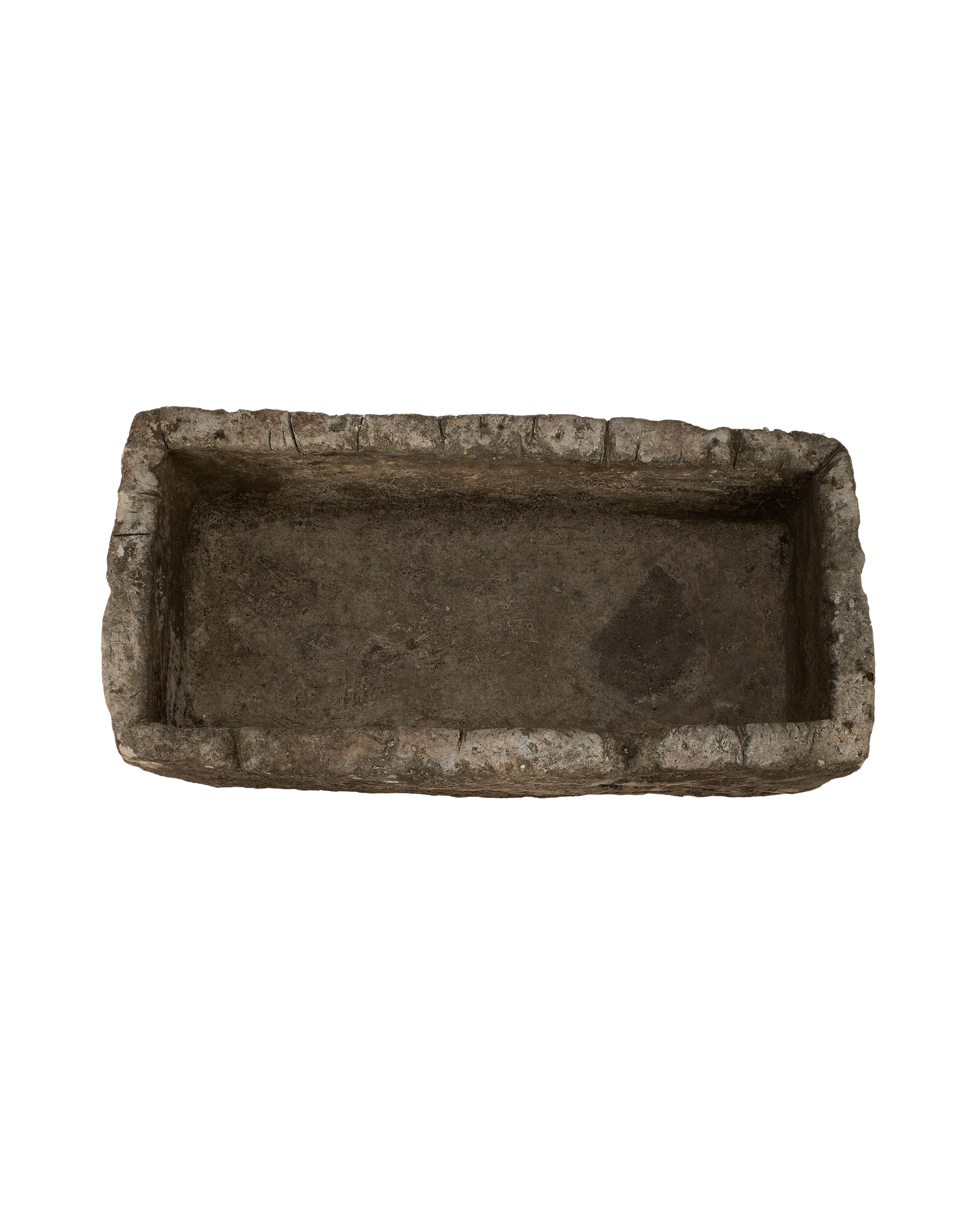 Vintage Indonesian rectangular limestone trough, top-down view showing interior depth and rough-hewn texture.