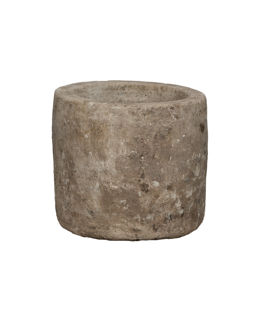Vintage Indonesian round limestone trough, side profile, weathered texture with age-appropriate patina.